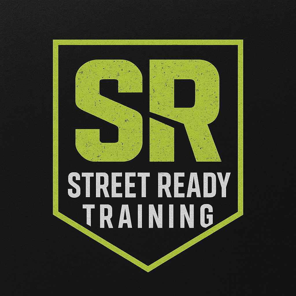 A black background with a green shield-shaped emblem containing the letters "SR" in large green font and the words "Street Ready Training" in smaller gray font underneath.