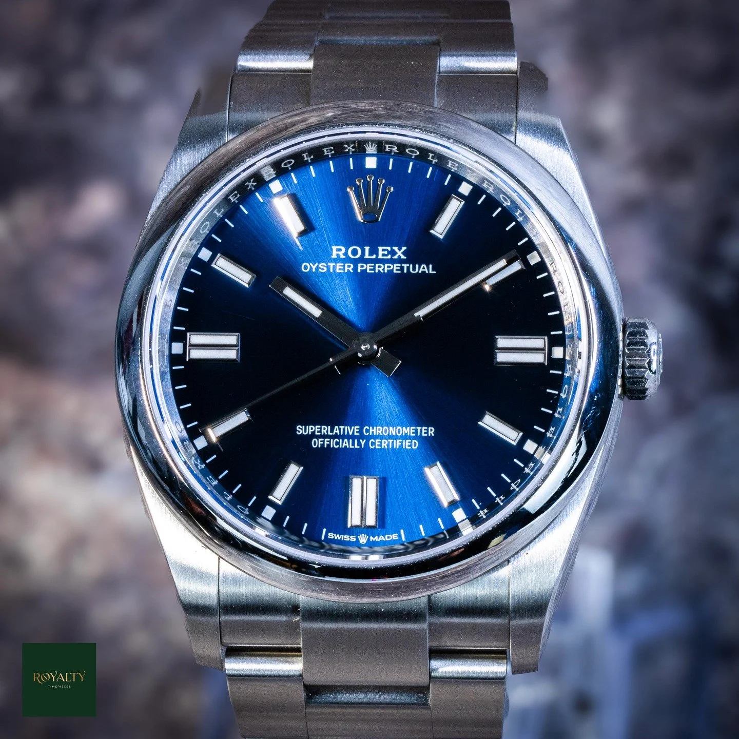 The definition of timeless versatility, the Rolex Oyster Perpetual 36 (Ref. 126000) captures the purest essence of the Oyster concept. At its heart is the striking Blue sunray finish dial, which catches the light with a dynamic depth that ranges from