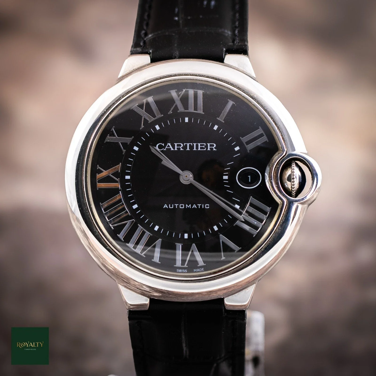 01_Cartier_Ballon_Bleu_42mm_WSBB0003_Black_Dial_Leath.webp