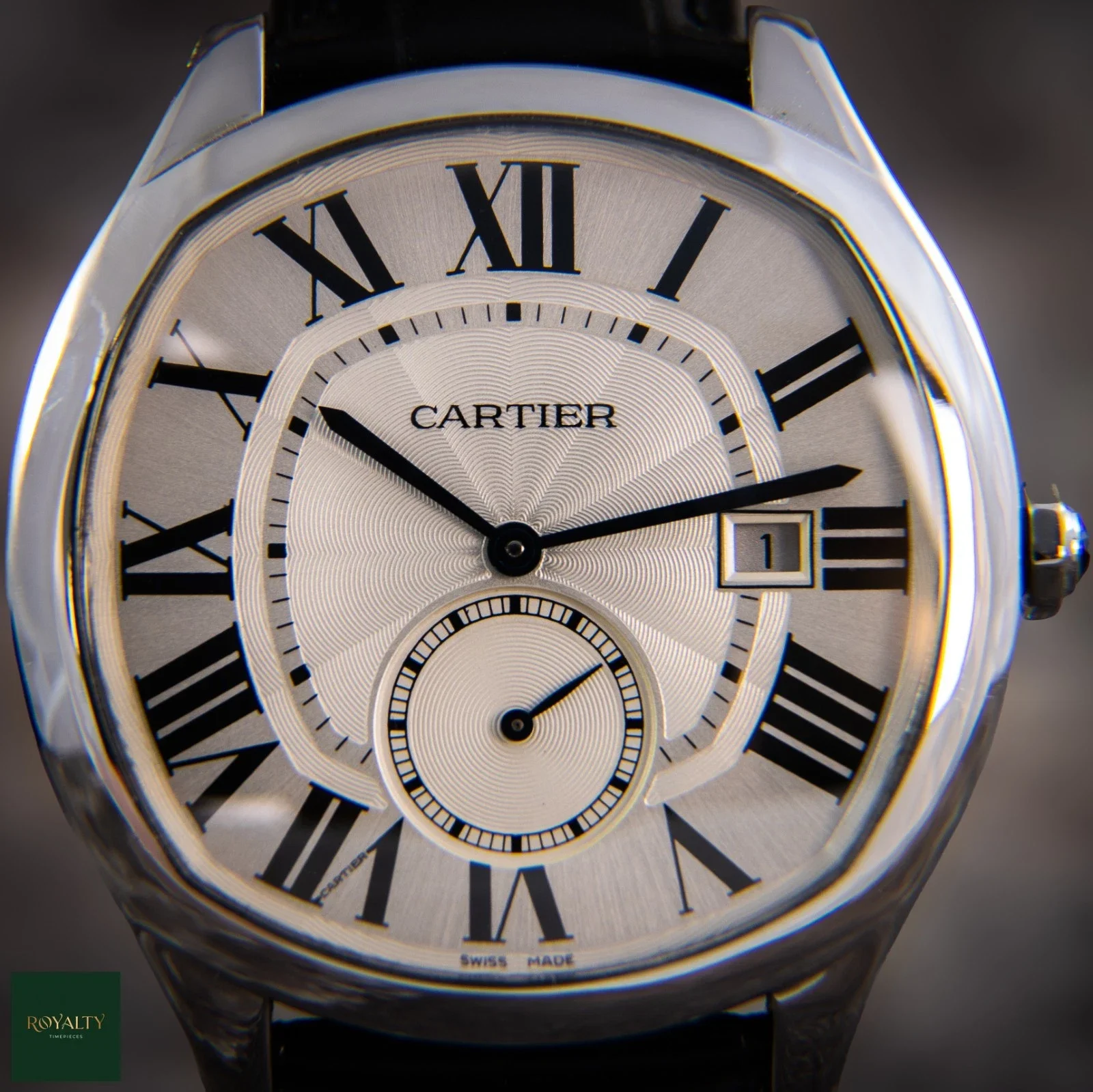 03_Cartier_Drive_WSNM0004_40mm_Silver_Guilloche_Dial_.webp