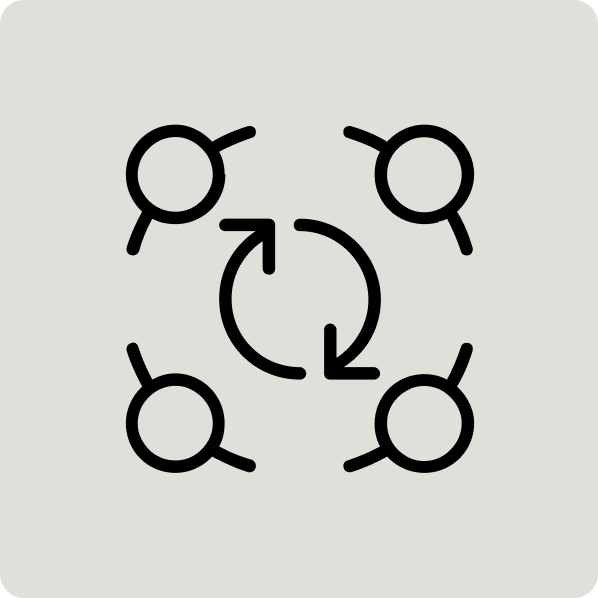 A diagram showing four circles connected in a square with a circular arrow in the center indicating a cycle or rotation.