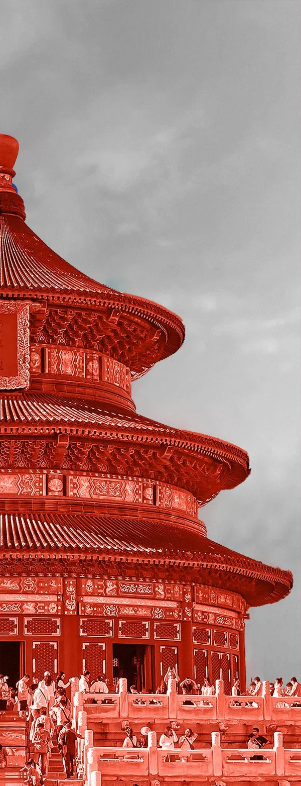 Red pagoda with traditional Chinese architecture, surrounded by people on a stone platform, under a cloudy sky.