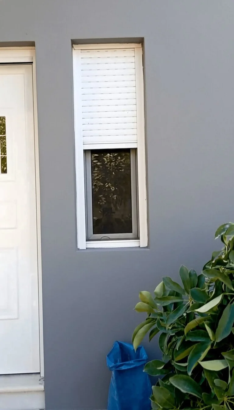 Close-up of exterior wall with a window frame after the exterior thermal facade installation and modernization.