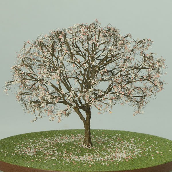 a scale model of a tree with spring foliage