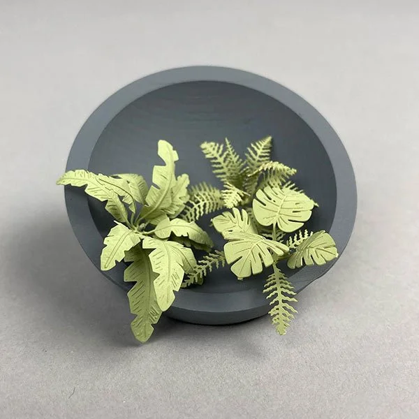 a scale model of ferns and banana plants