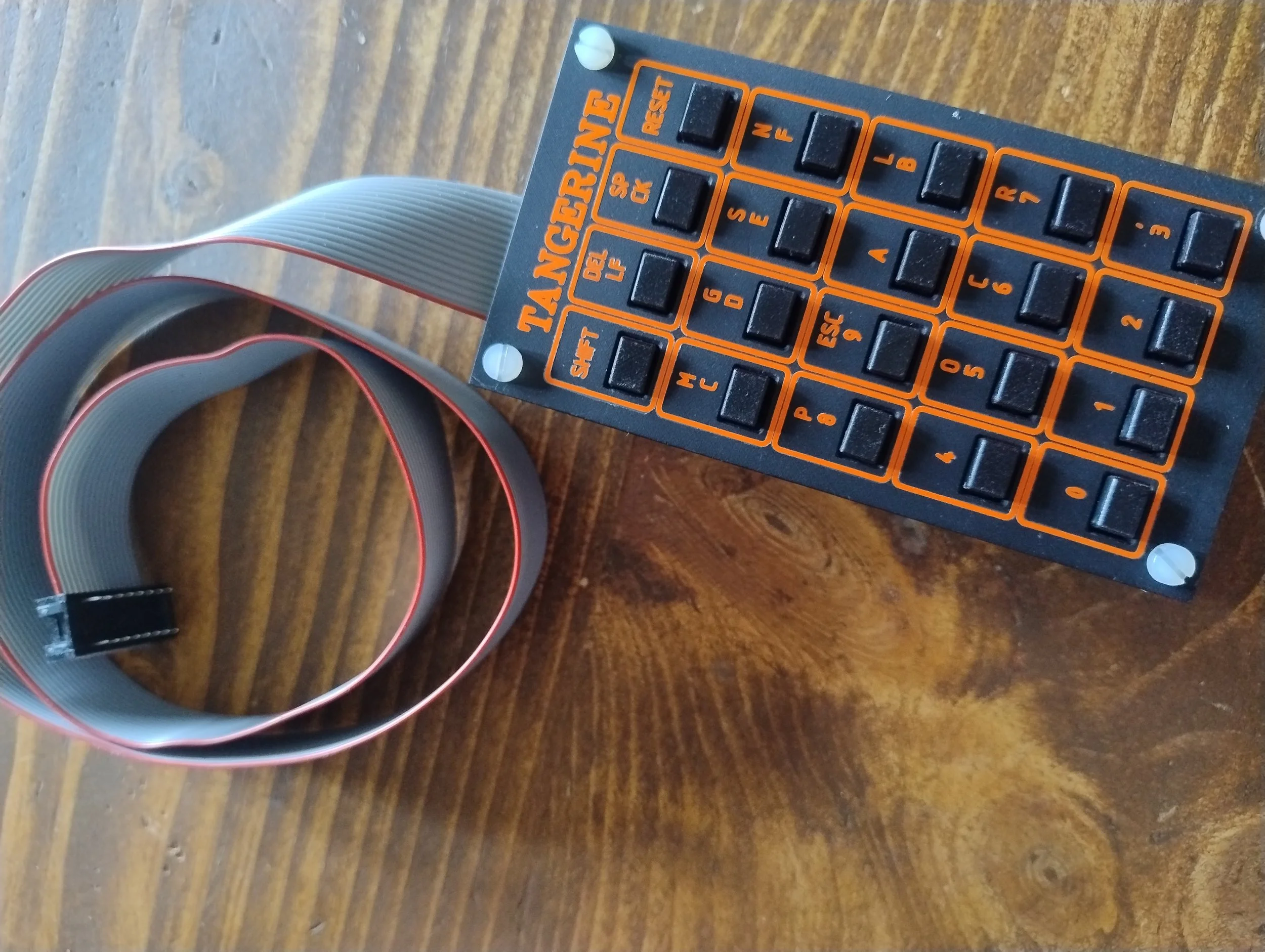 Orange Dry transfers designed and applied by Andrew Menadue to finish their replica retro computer keypad. 