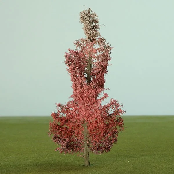 a scale model of a stylised pink tree