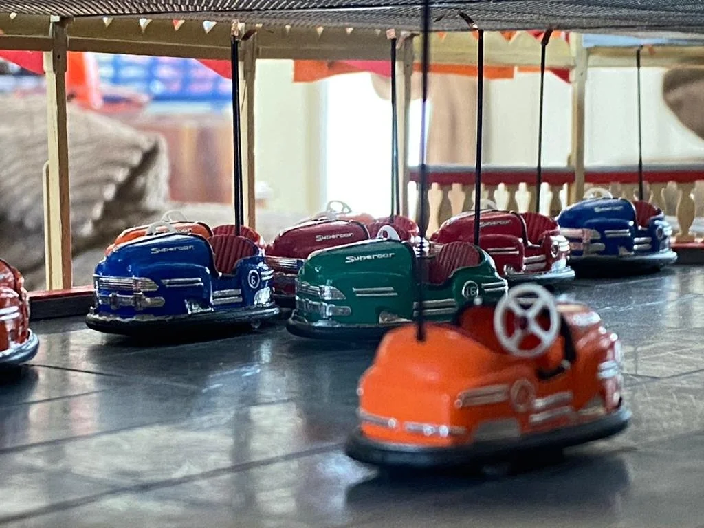 Bumper cars, sculpted and painted by Nigel Prince.  Moulded and cast by Arch60
