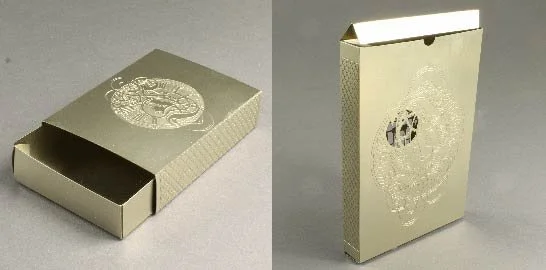 A playing card box constructed from etched nickel silver.