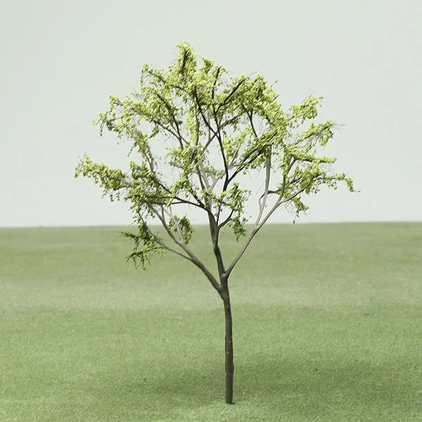a scale model of a tree with spring foliage