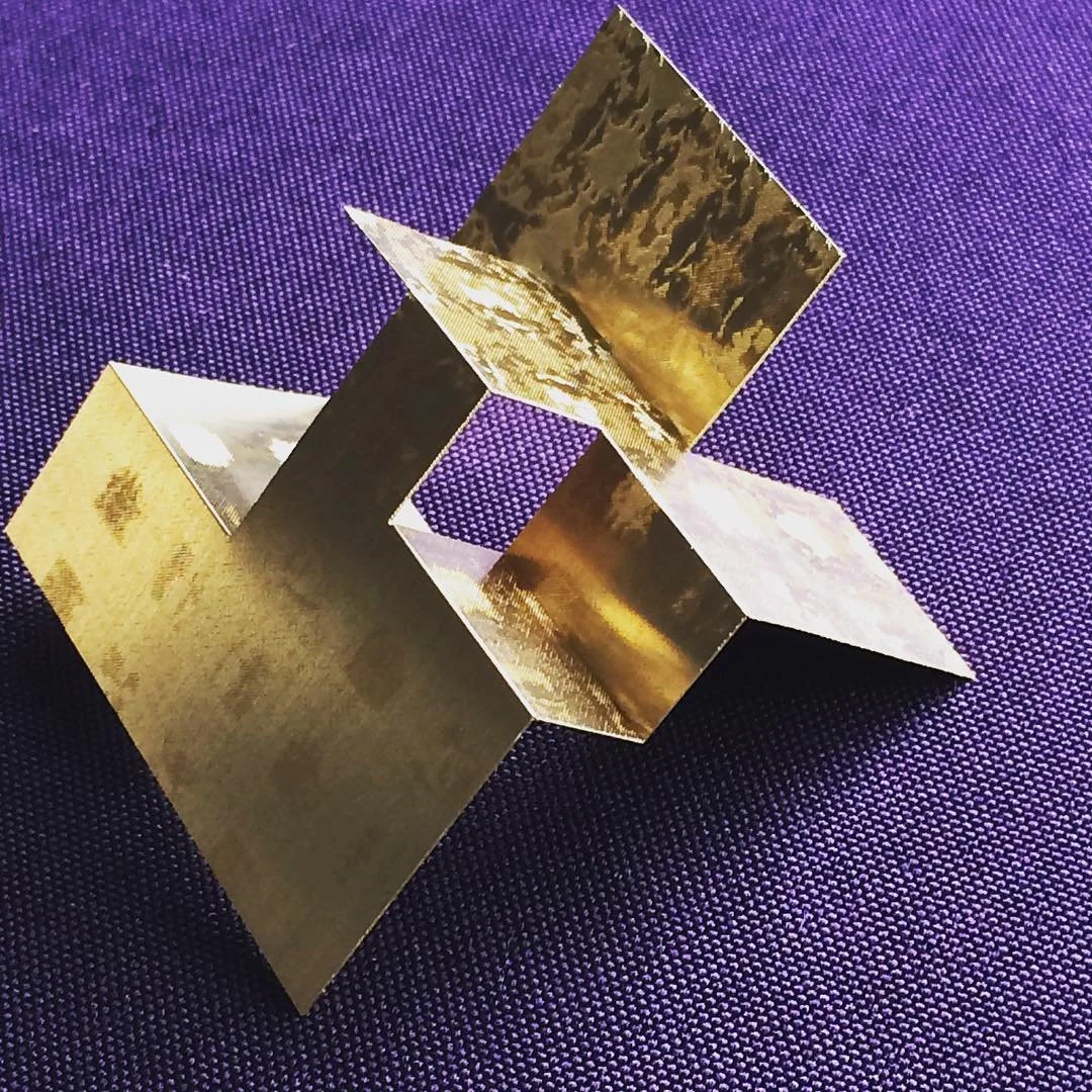 sculptural etching in brass