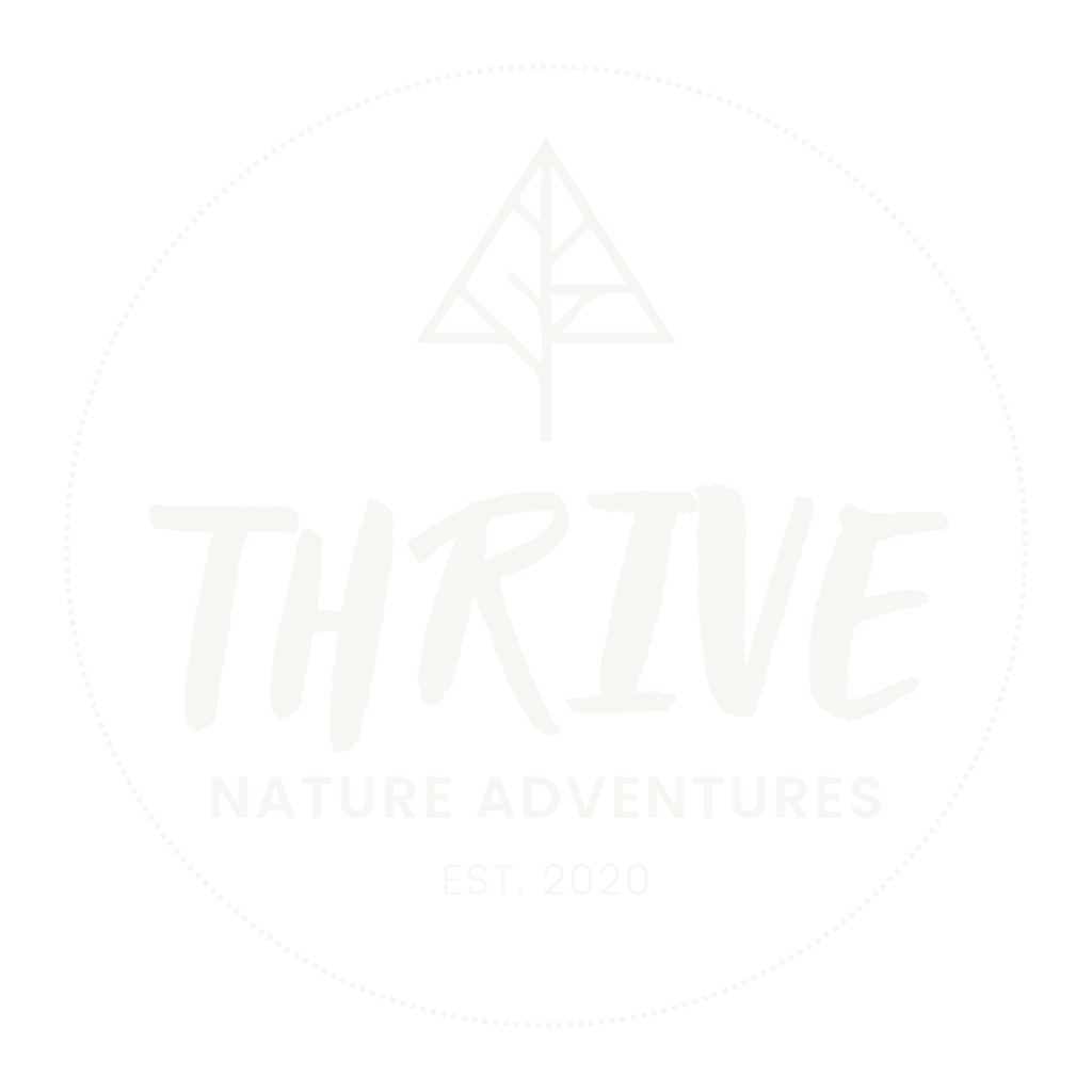 A black circular logo with a white outline, featuring a stylized leaf symbol at the top. The word "THRIVE" is prominently displayed in large, white, handwritten font. Below it, in smaller capital letters, are the words "NATURE ADVENTURES". Under that, the text reads "EST. 2020" in smaller capital letters.