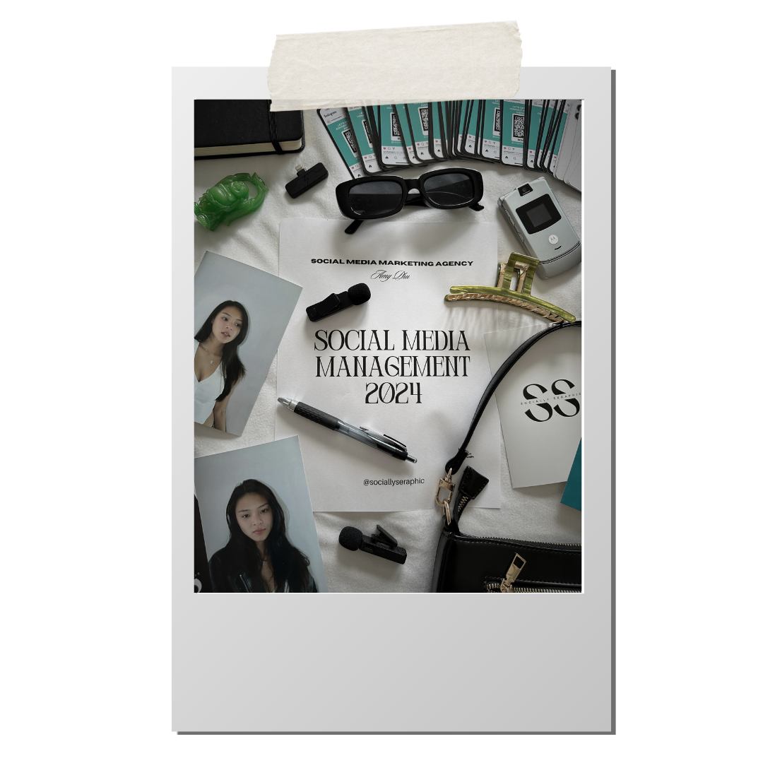 Desk with social media management materials including a printed document titled 'Social Media Management 2024', photos of women, a laptop, sunglasses, a voice recorder, a webcam, a small green figurine, a gold hair clip, a camera, and various electronic devices.