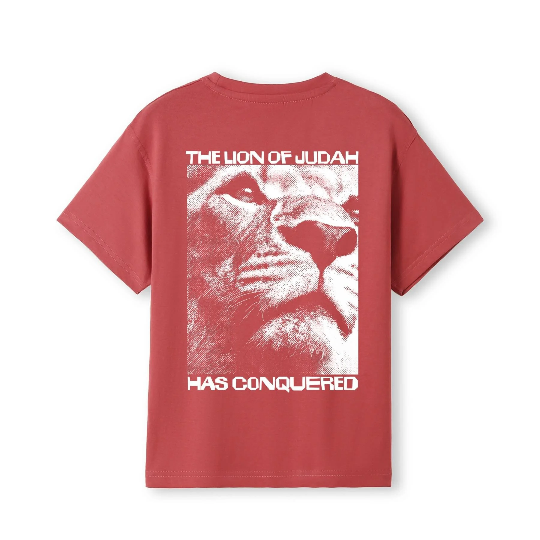 Coral red color Christian T-shirt with the words 'The Lion of Judah has conquered' and an image of a lion head