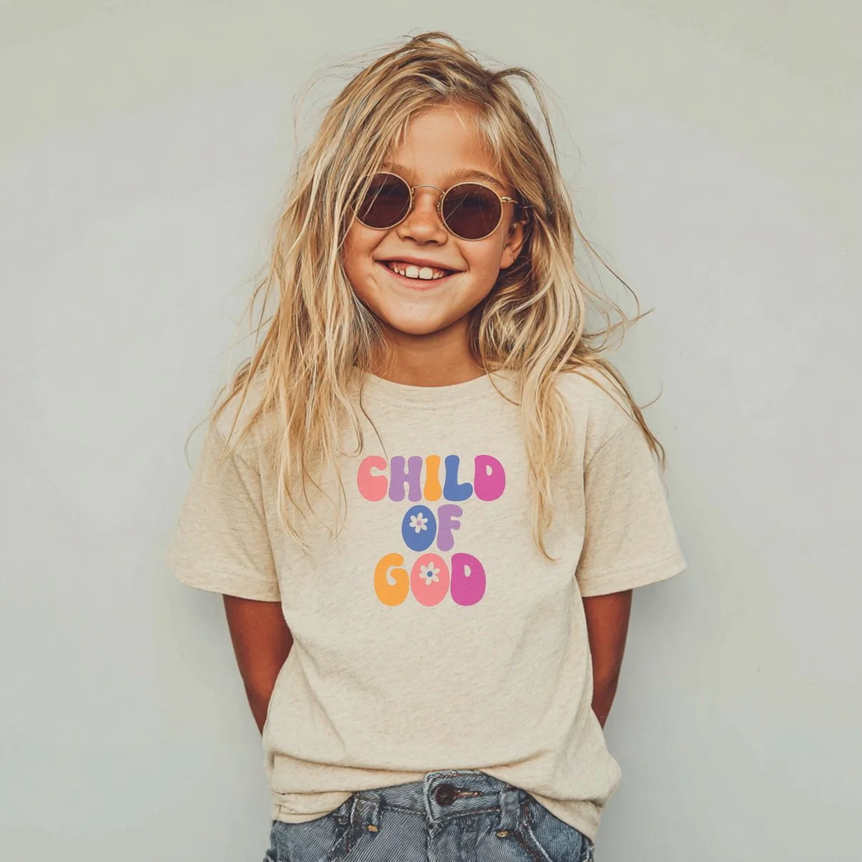 Mock up_Kids_Child of God_Tan girl with sunnies.jpg