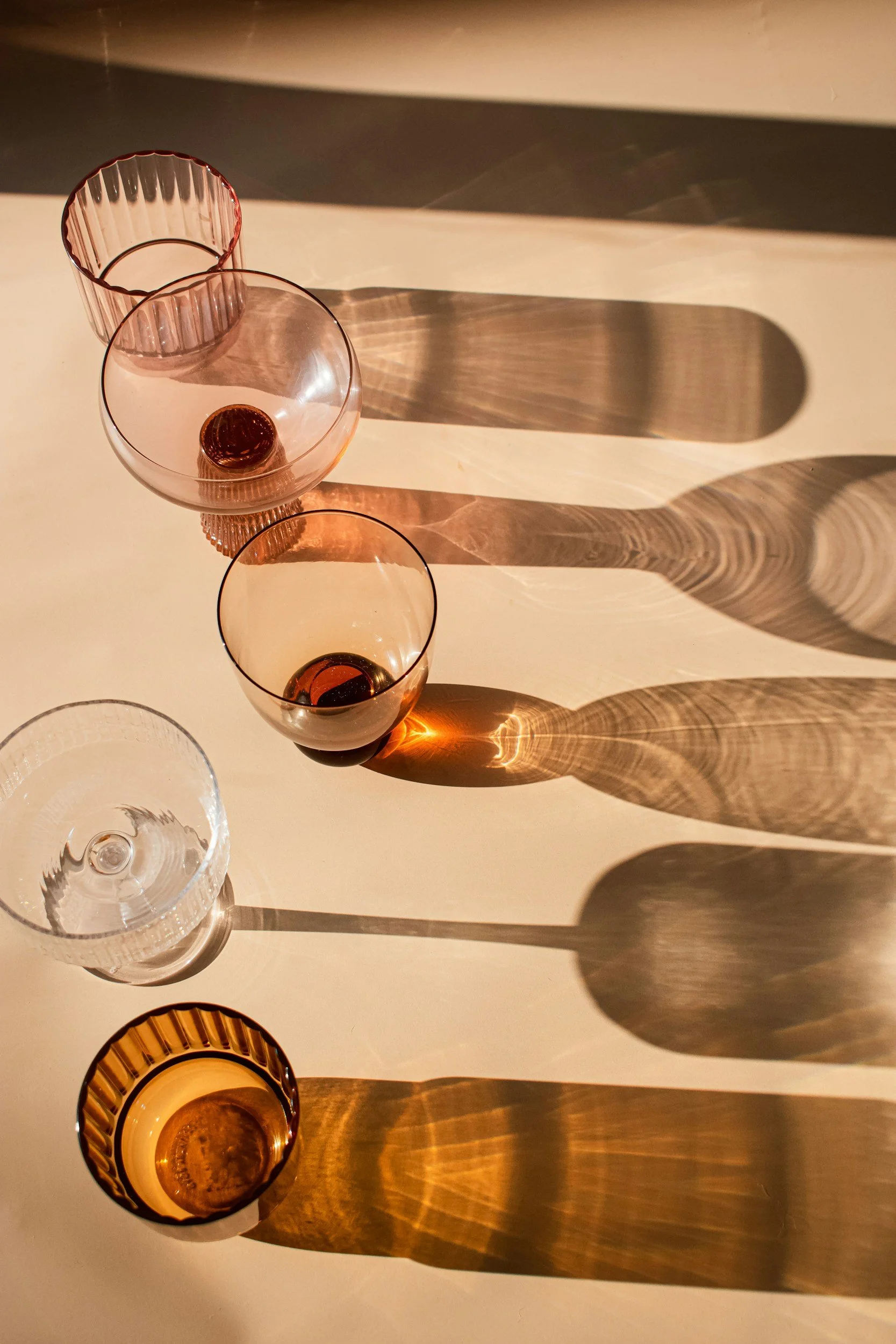 an array of vintage cocktail glasses