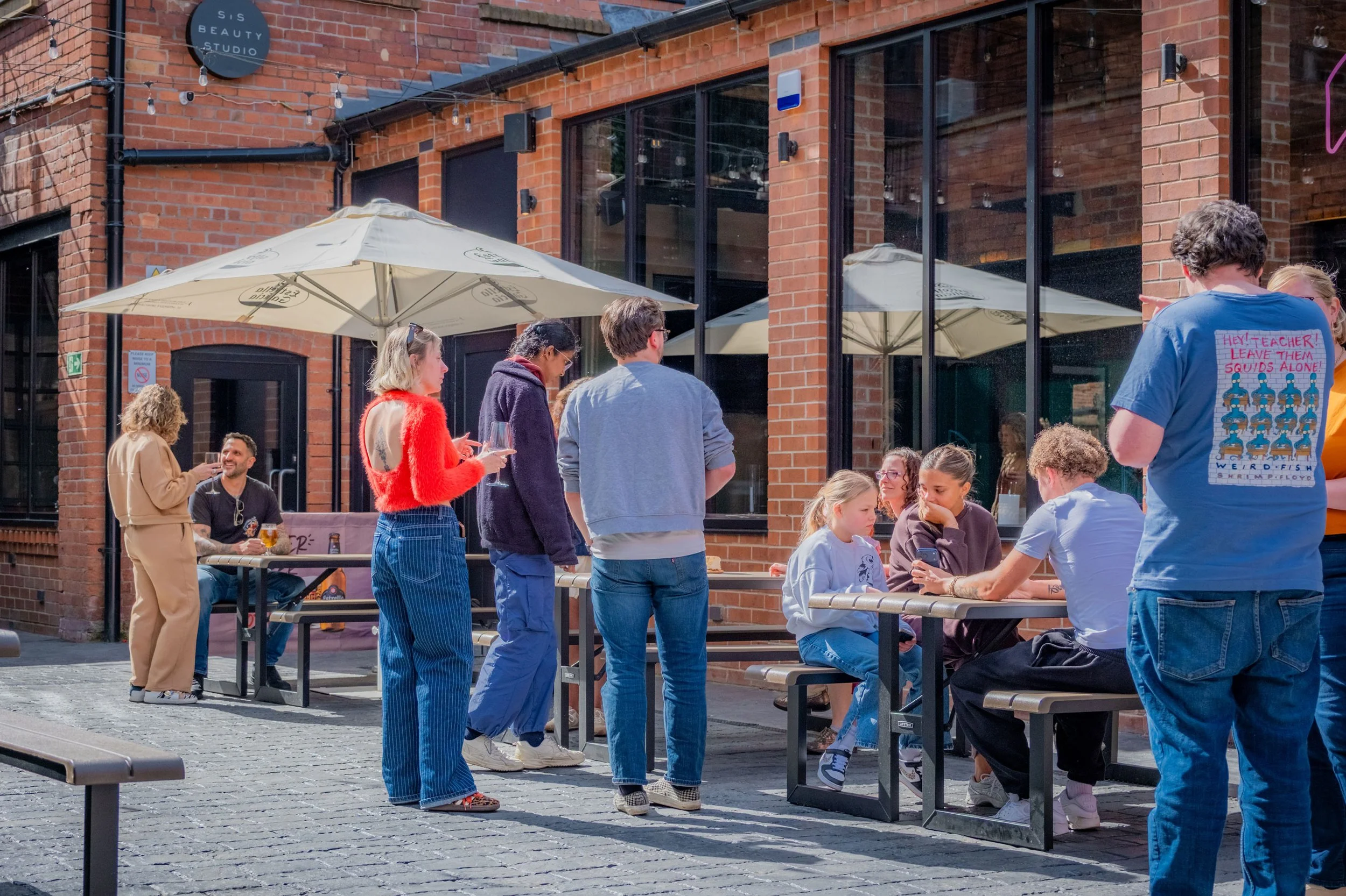 People gathered in Merchants House Courtyard