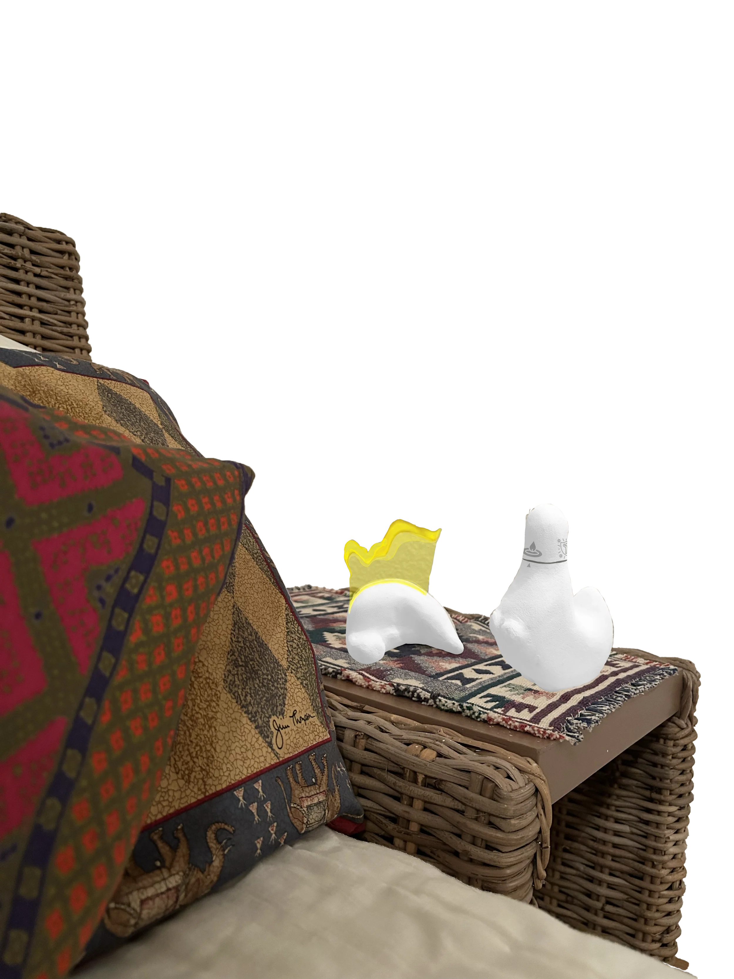 lying down dino nightlight and standing dino speaker on the bedside table