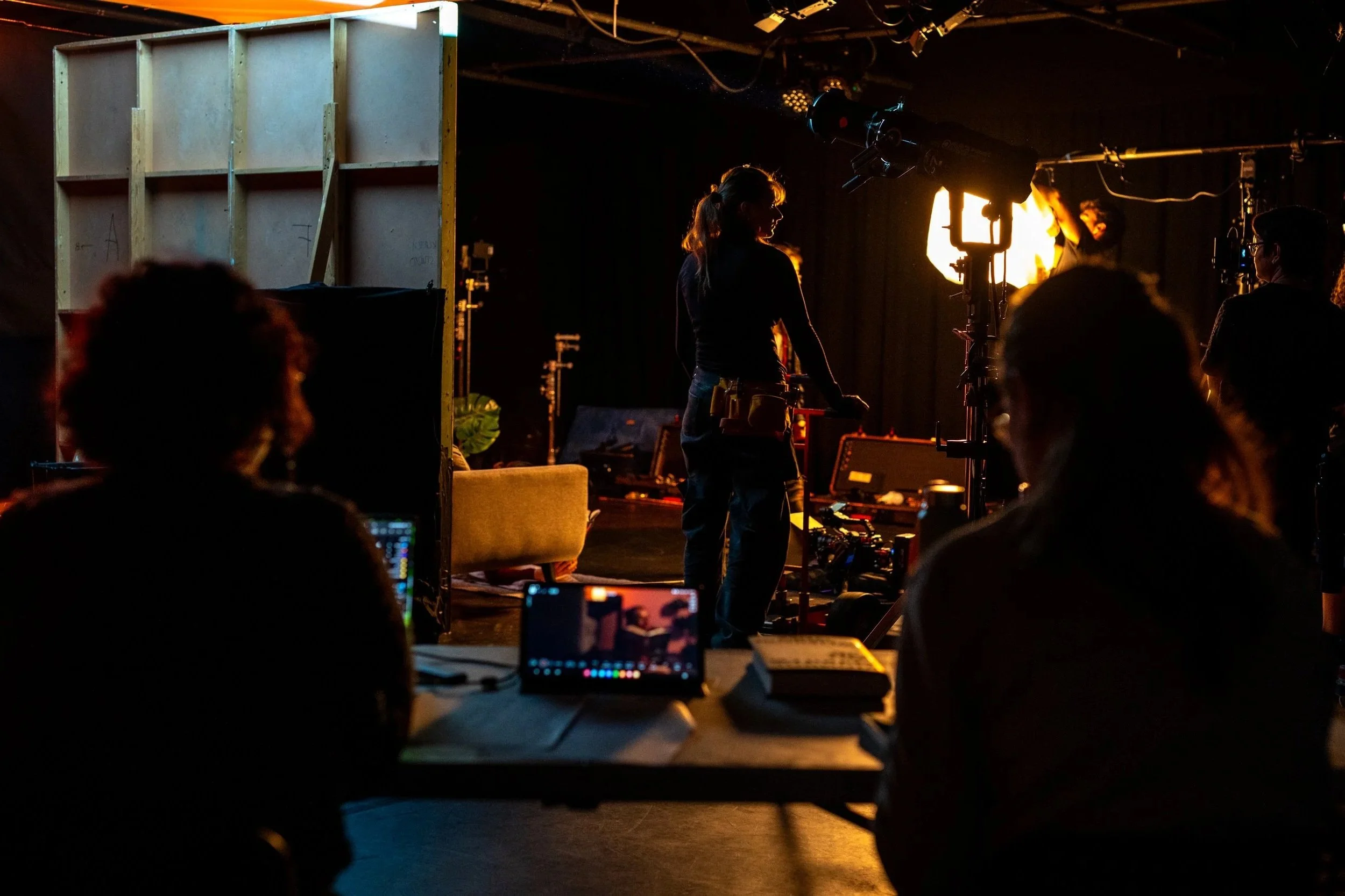 Film production crew on set with professional lighting equipment during a book trailer shoot for a UK publisher, produced by Gunpowder House Productions