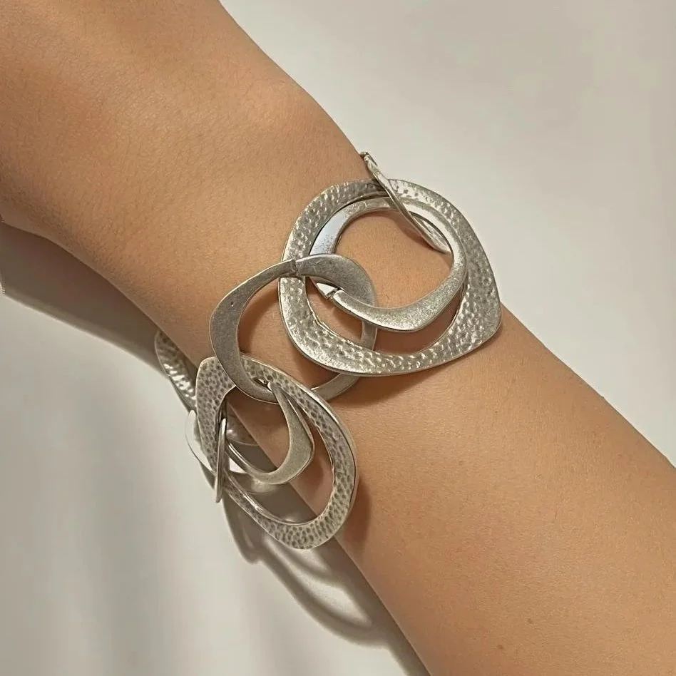 Bracciale anelli intrecciati argentati