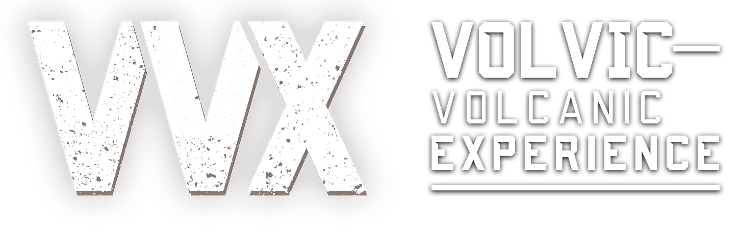 WXX Volvic volcanic experiment logo, with black background and stylized black and white text.