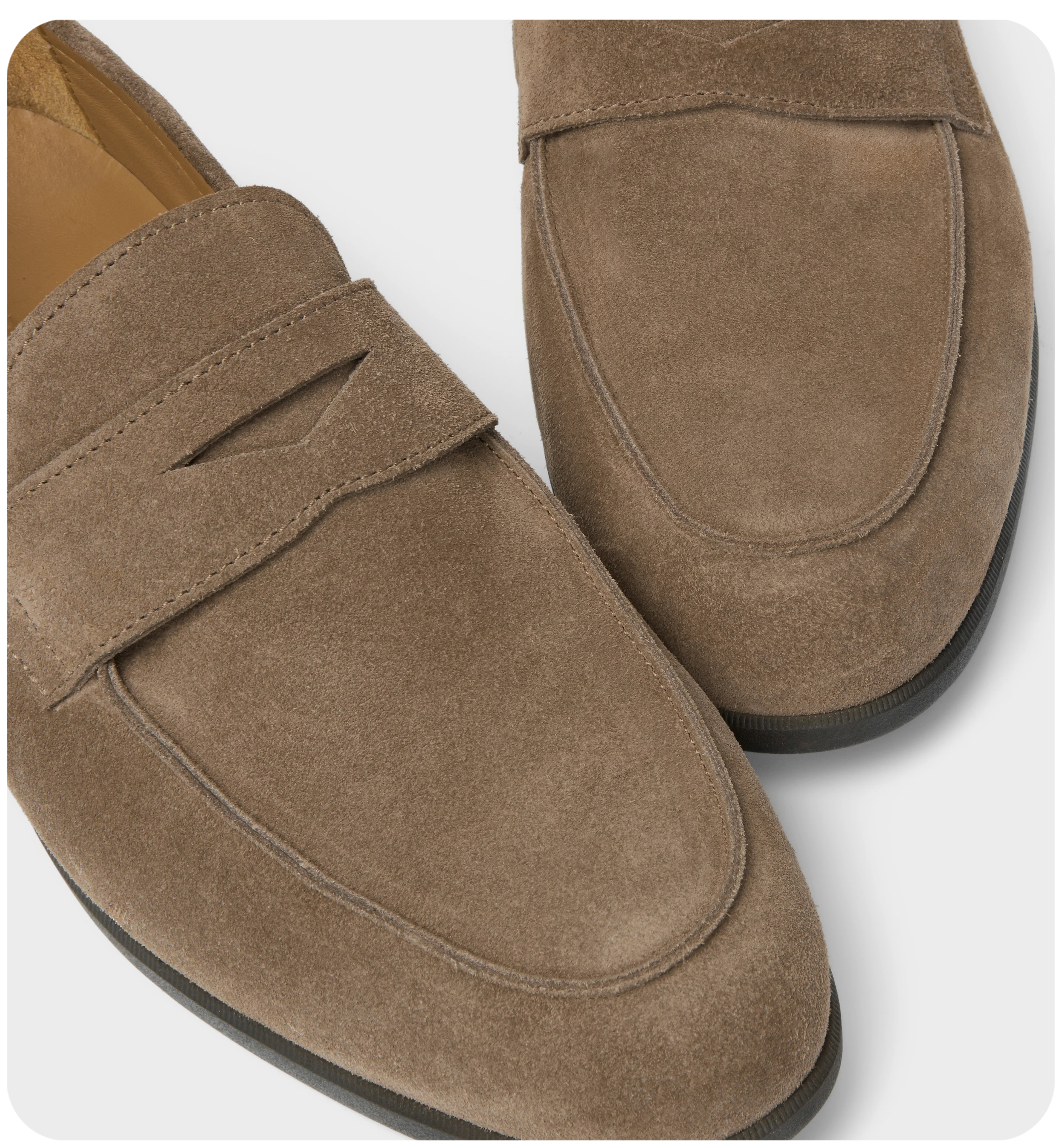 A pair of Italian-made men's suede loafers for online marketing and community building.