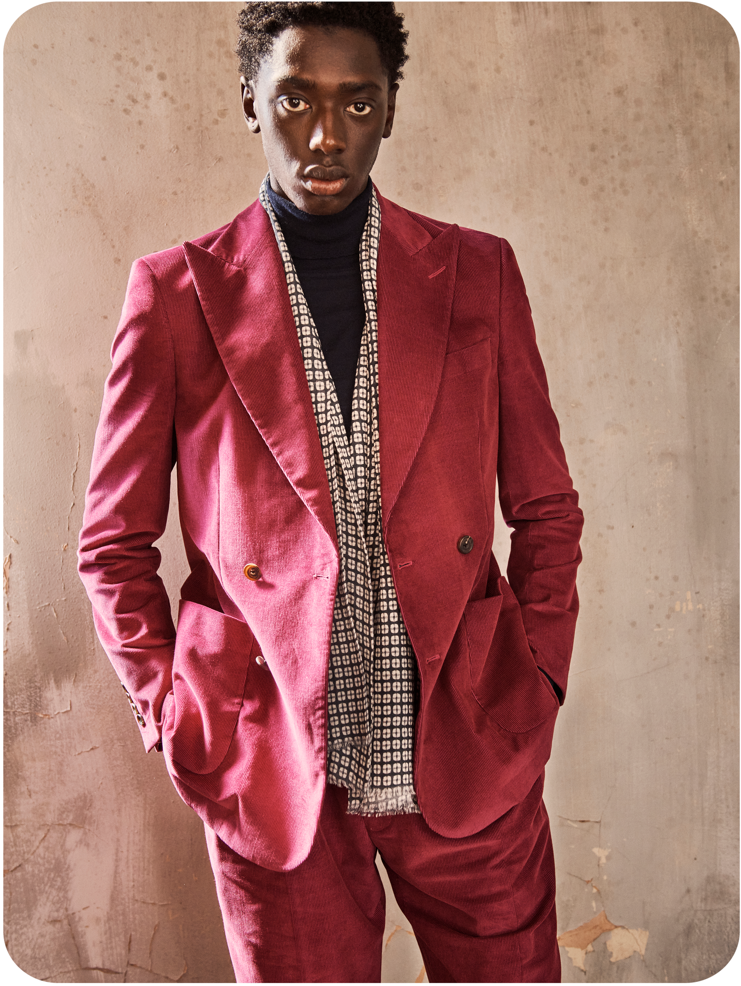 A model wears a corduroy Richard James Savile Row suit for an ecommerce lookbook.