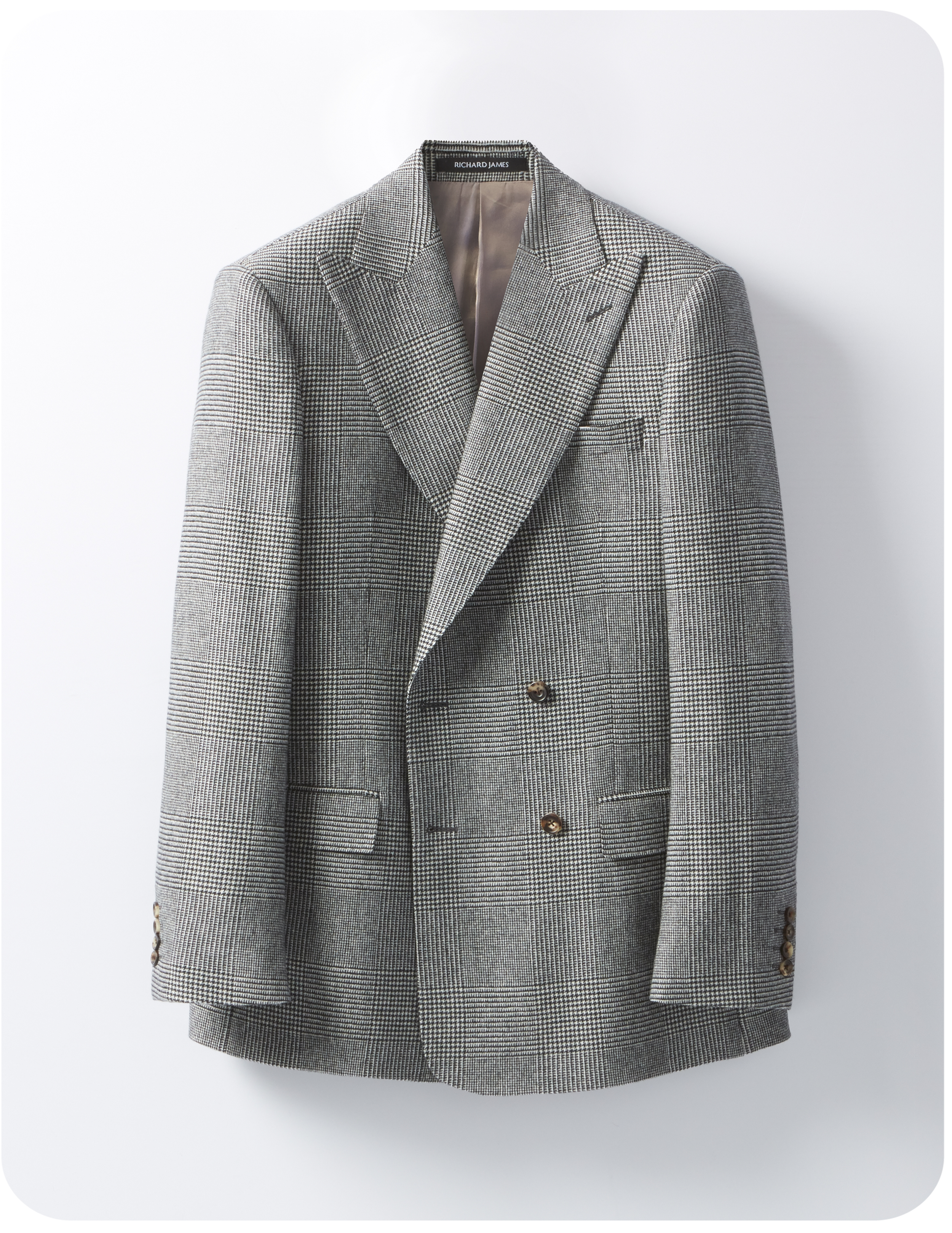 An ecommerce flatshot of a double-breasted Richard James suit.