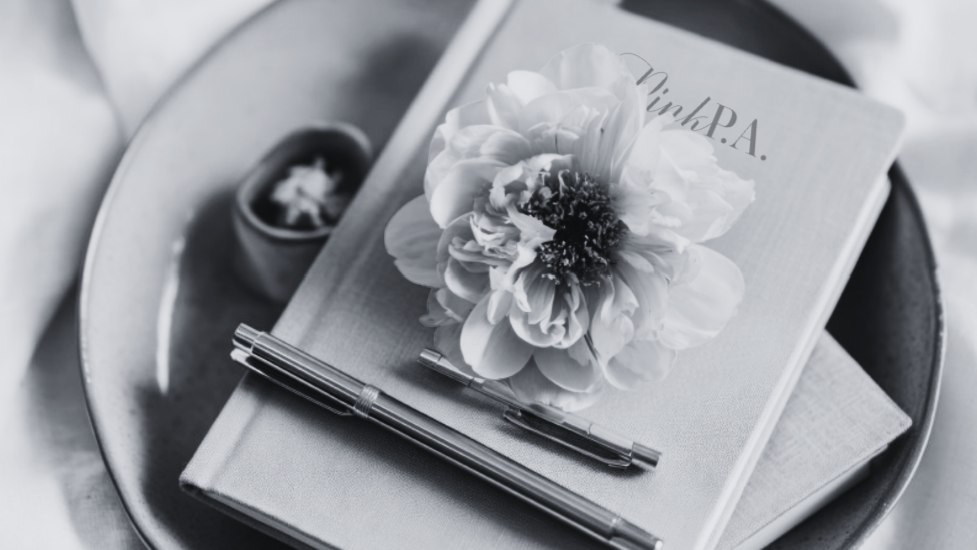 The Pink PA branded notebook.