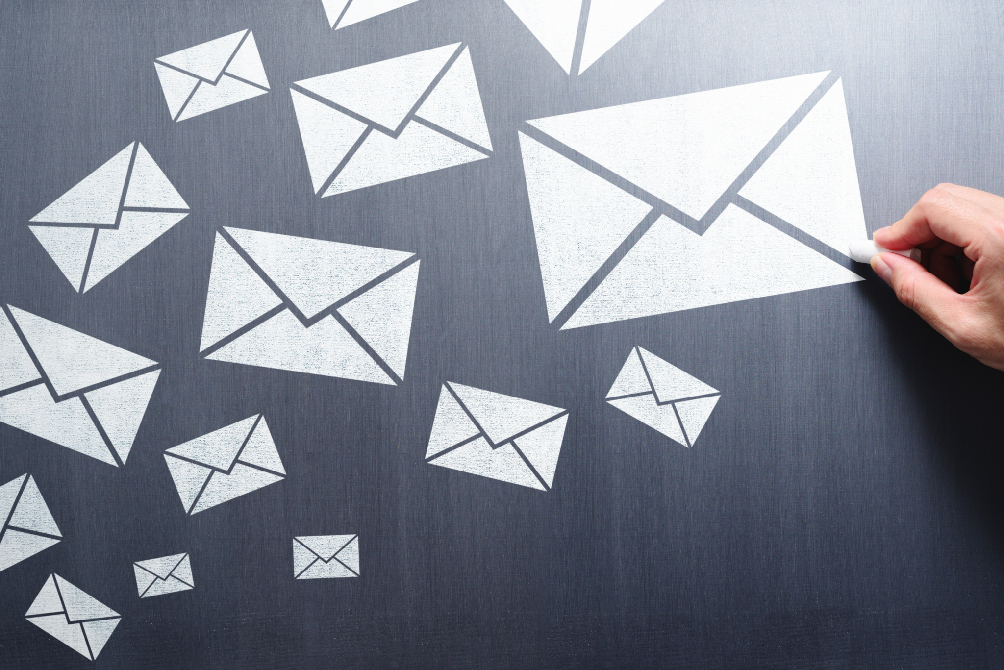 envelopes drawn onto a chalk board