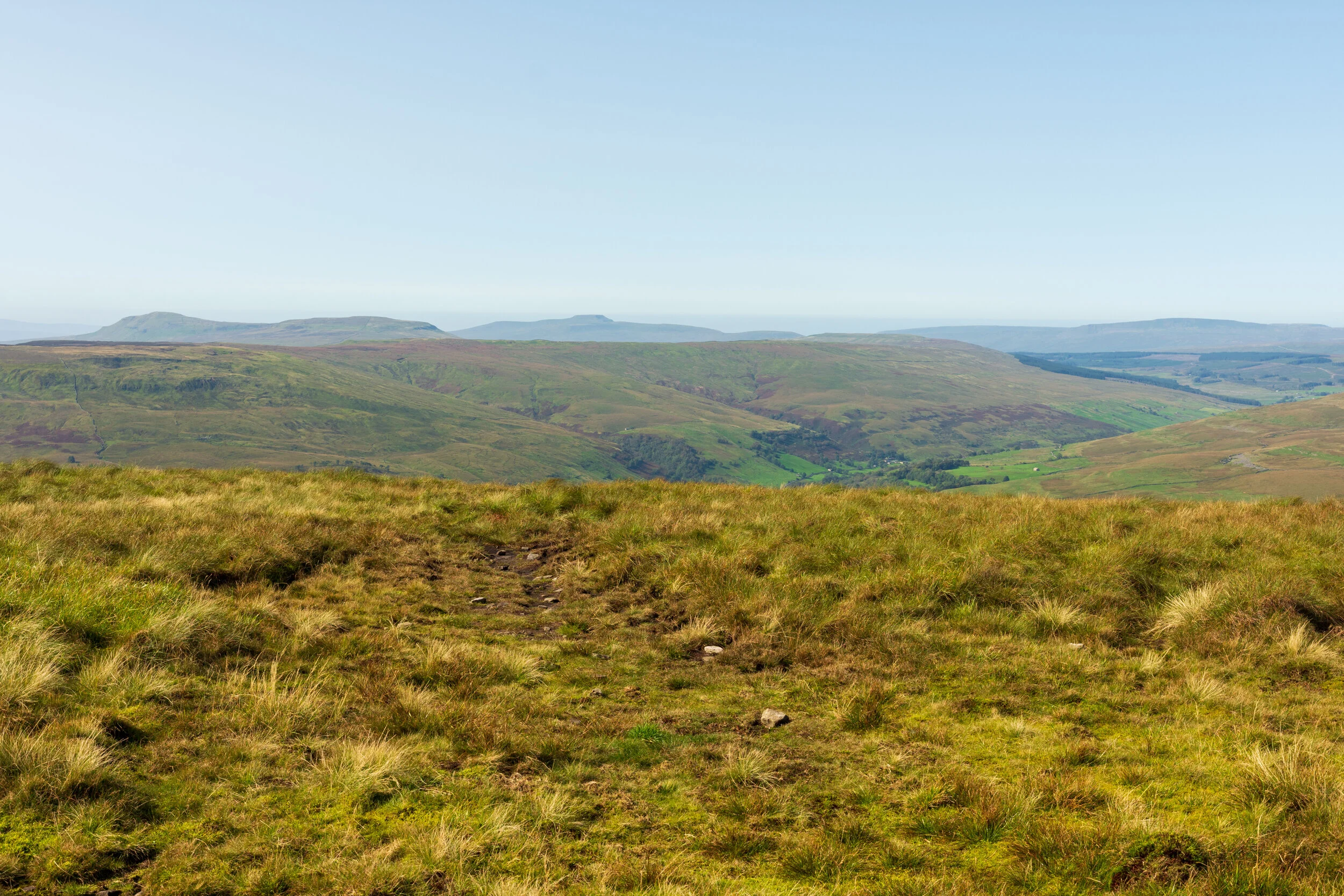 The more famous Yorkshire Three Peaks of (L-R) Pen-y-Ghent, Ingleborough and Whernside