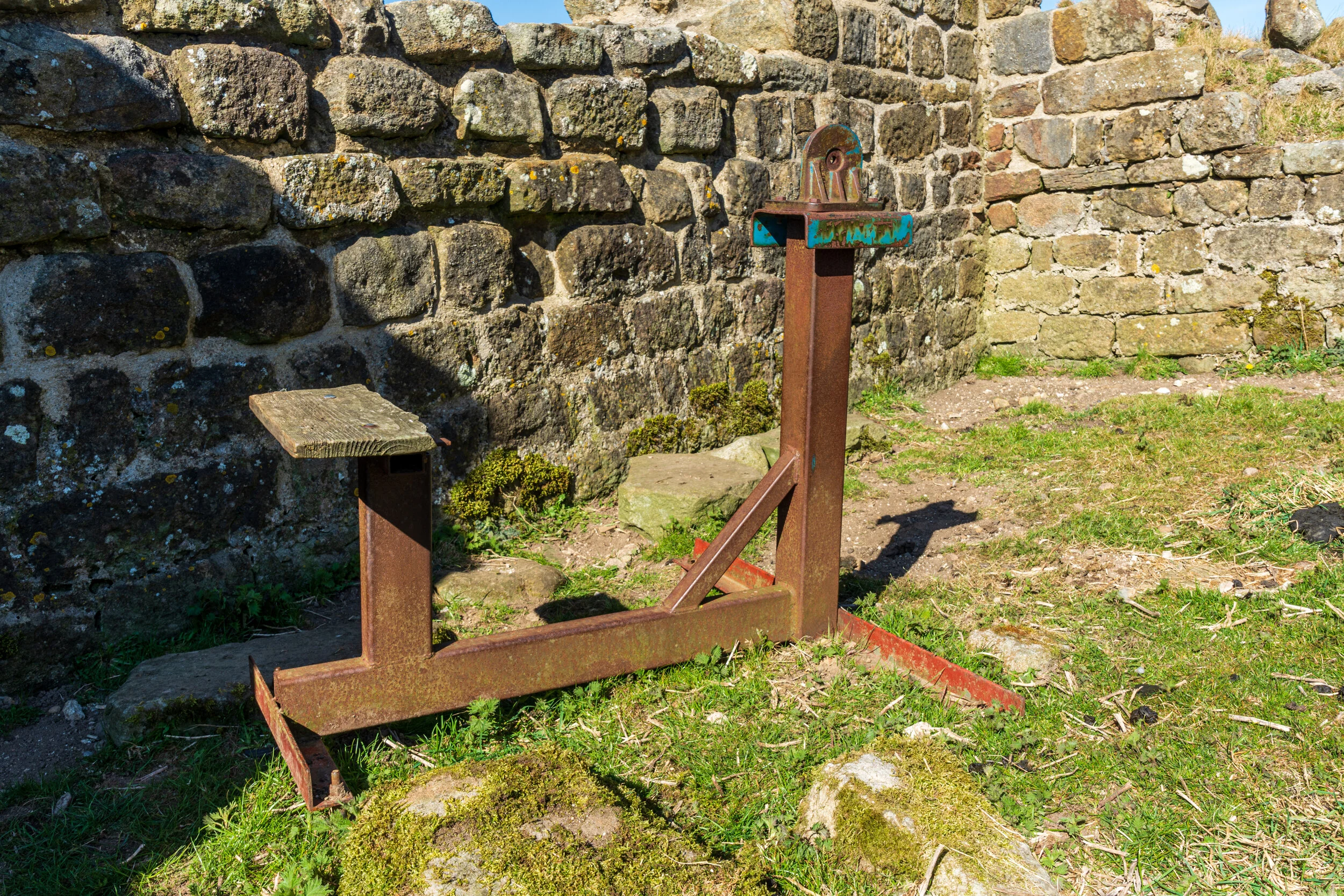 The remains of a machine inside the tower, likely not period, and left over from previous restoration work