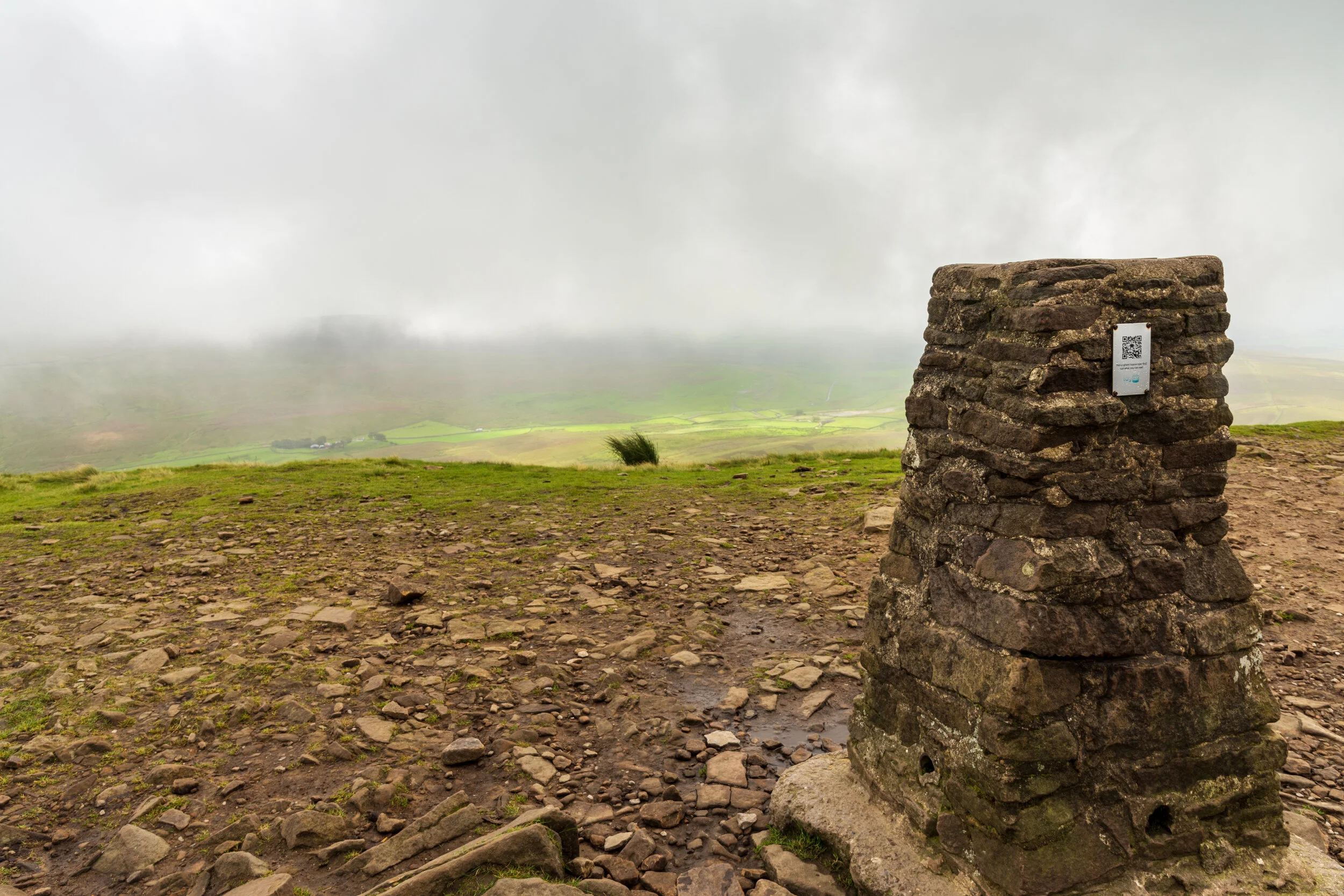 The summit of Pen-y-Ghent on a rather wet day