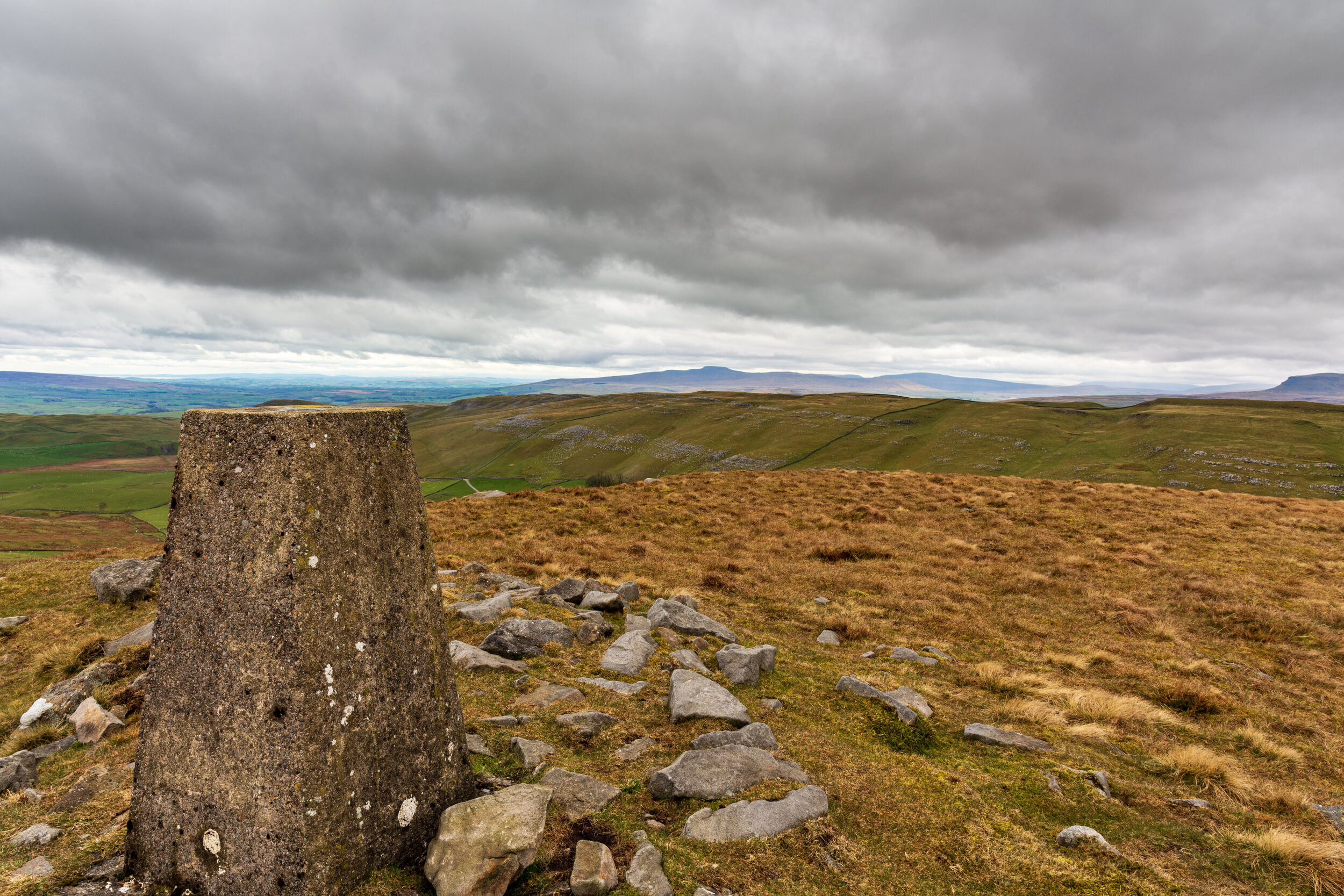 The summit of Rye Loaf Hill, looking north towards the Yorkshire Three Peaks