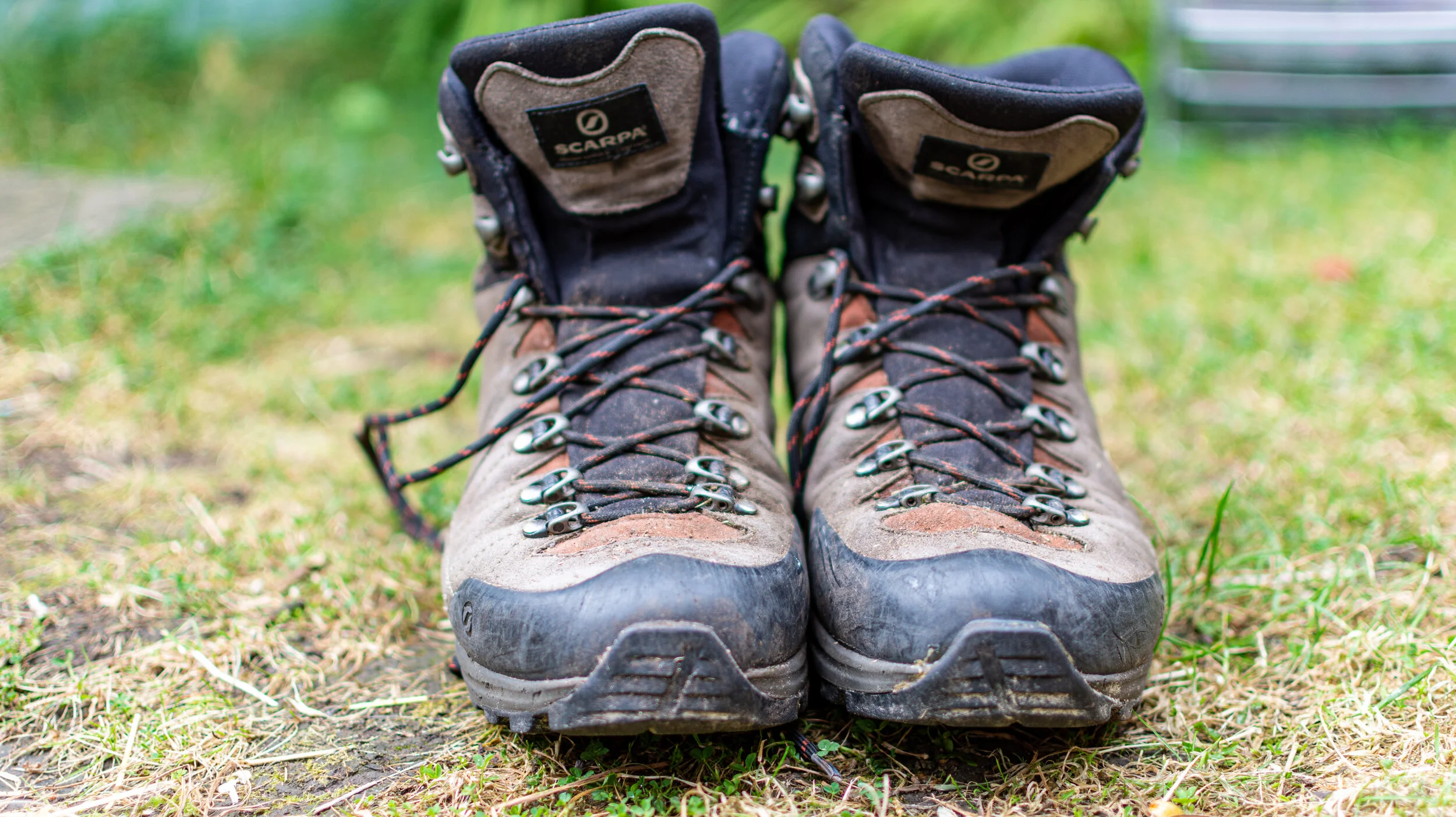 A pair of walking boots, waiting to be put on, showing the outdoors provides us with so many metaphors for mindset and mindfulness