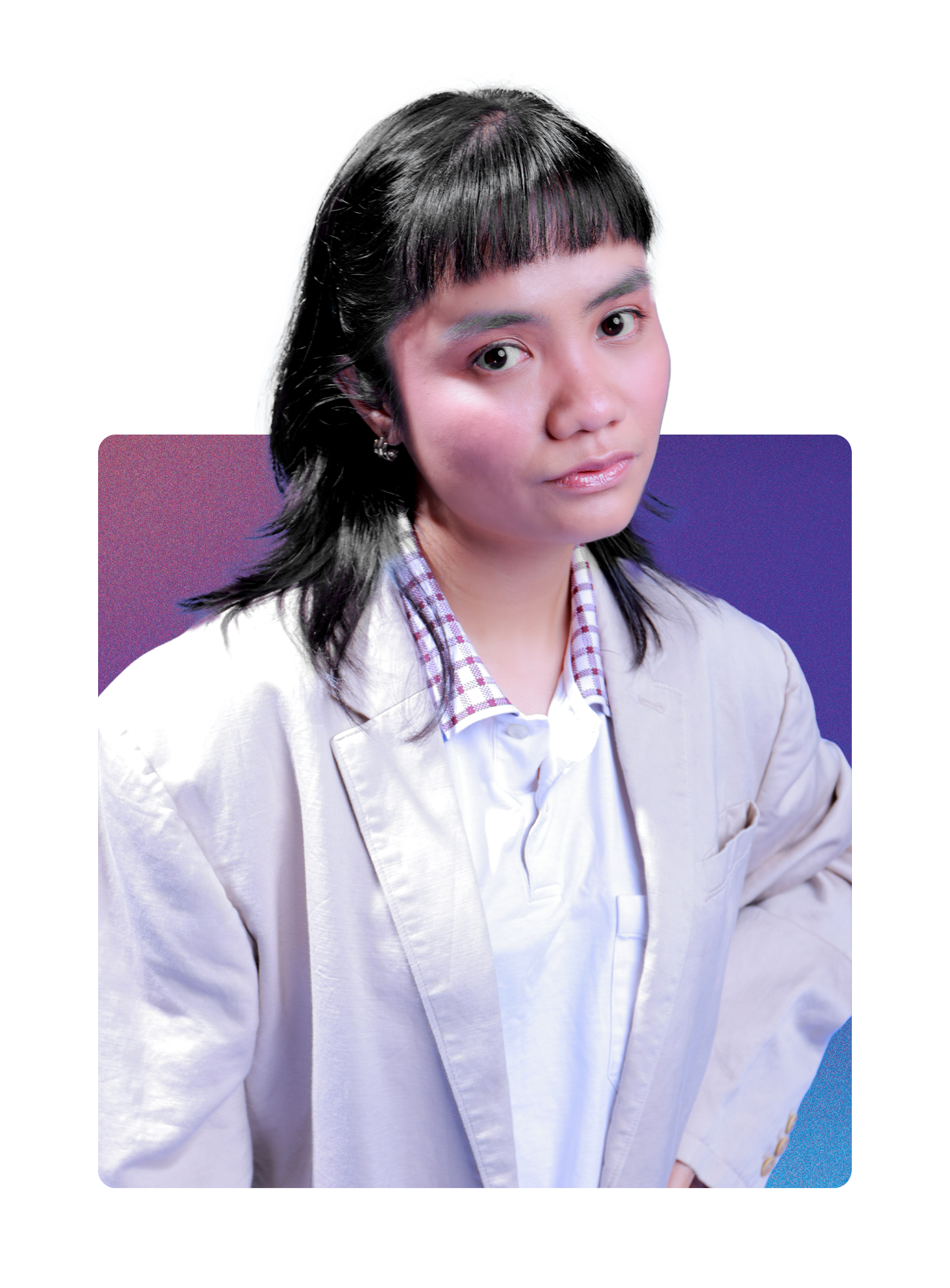 A young woman with black hair, wearing a white blazer over a collared shirt, posing for a portrait against a colorful background.