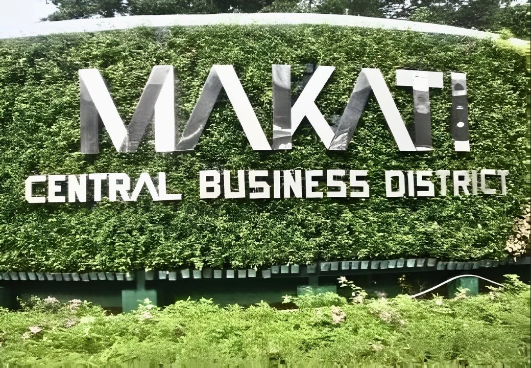 Sign for MKT: Central Business District with large green background and reflective silver letters.