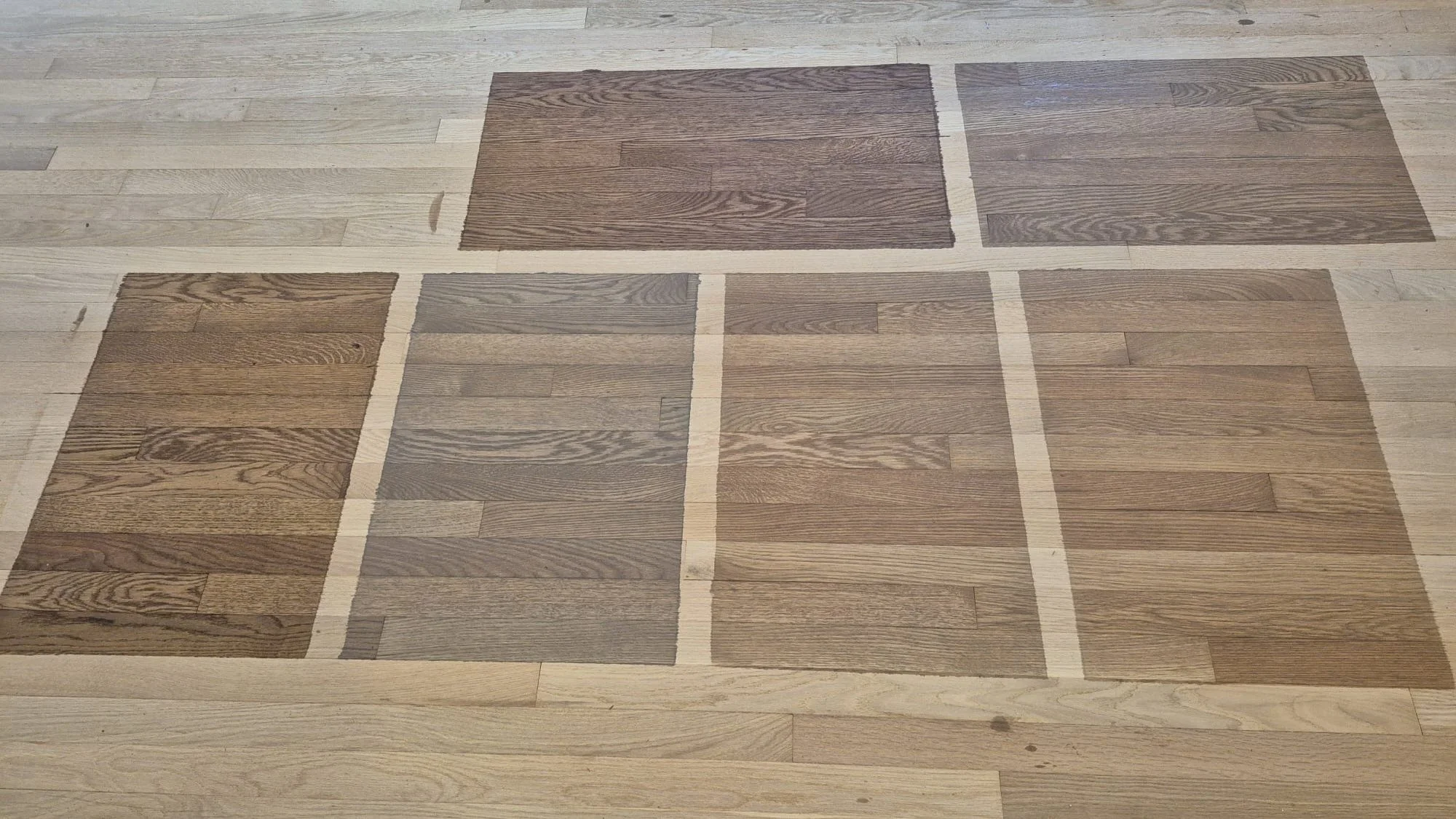 Which one would you choose? 👀👇

These are the stain color options we&rsquo;re reviewing for a client&rsquo;s upcoming floor project.