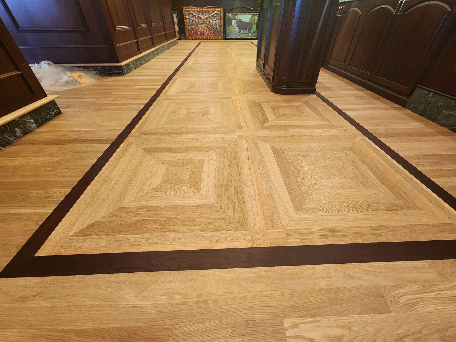 This floor deserves a spotlight ✨

Custom craftsmanship at its finest. Every angle, every seam, every detail was carefully measured and installed to create a bold, high-end statement.

The geometric design adds depth and character while keeping a tim