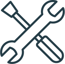 Line drawing of a wrench, screwdriver, and pliers crossed