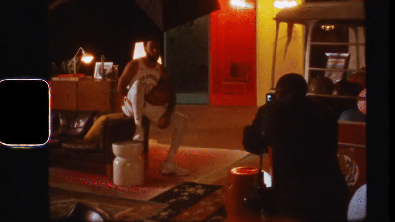 Photographer and creative director Reggie Thomas on set.