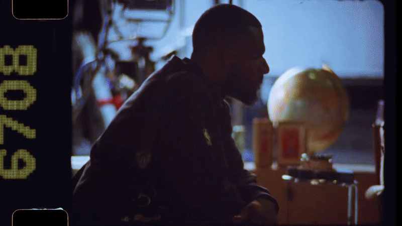 Photographer and creative director Reggie Thomas on set.