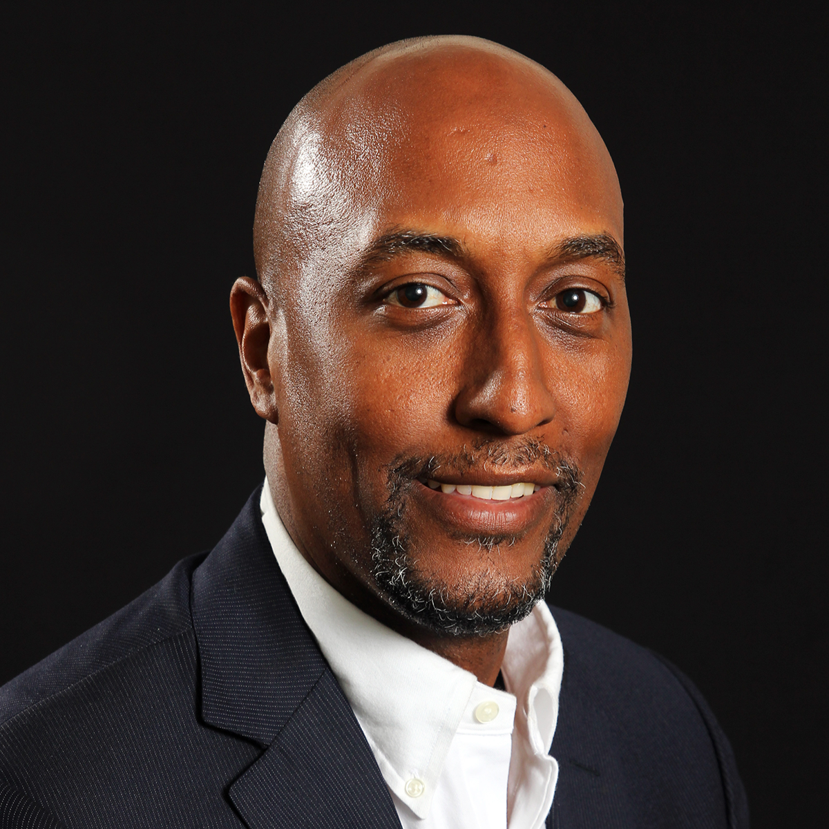 A handsome African-American man. Pastor John Nixon II. Testimonial.