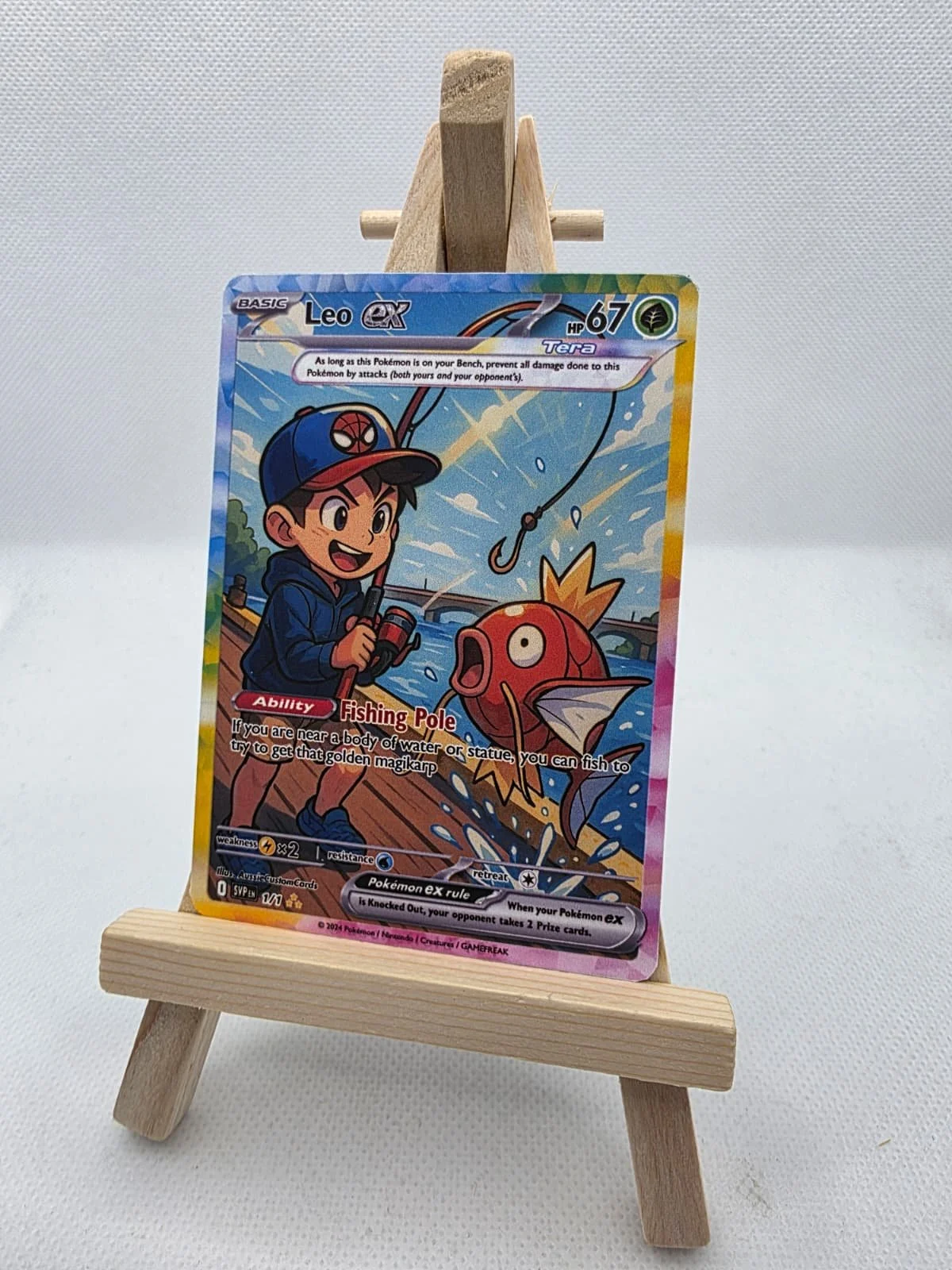 Pokemon trading card featuring a boy fishing with a red Magikarp on a wooden easel. Aussie Custom Cards specializes in high-quality custom Pokémon cards and personalised trading card gifts in Australia Custom cards