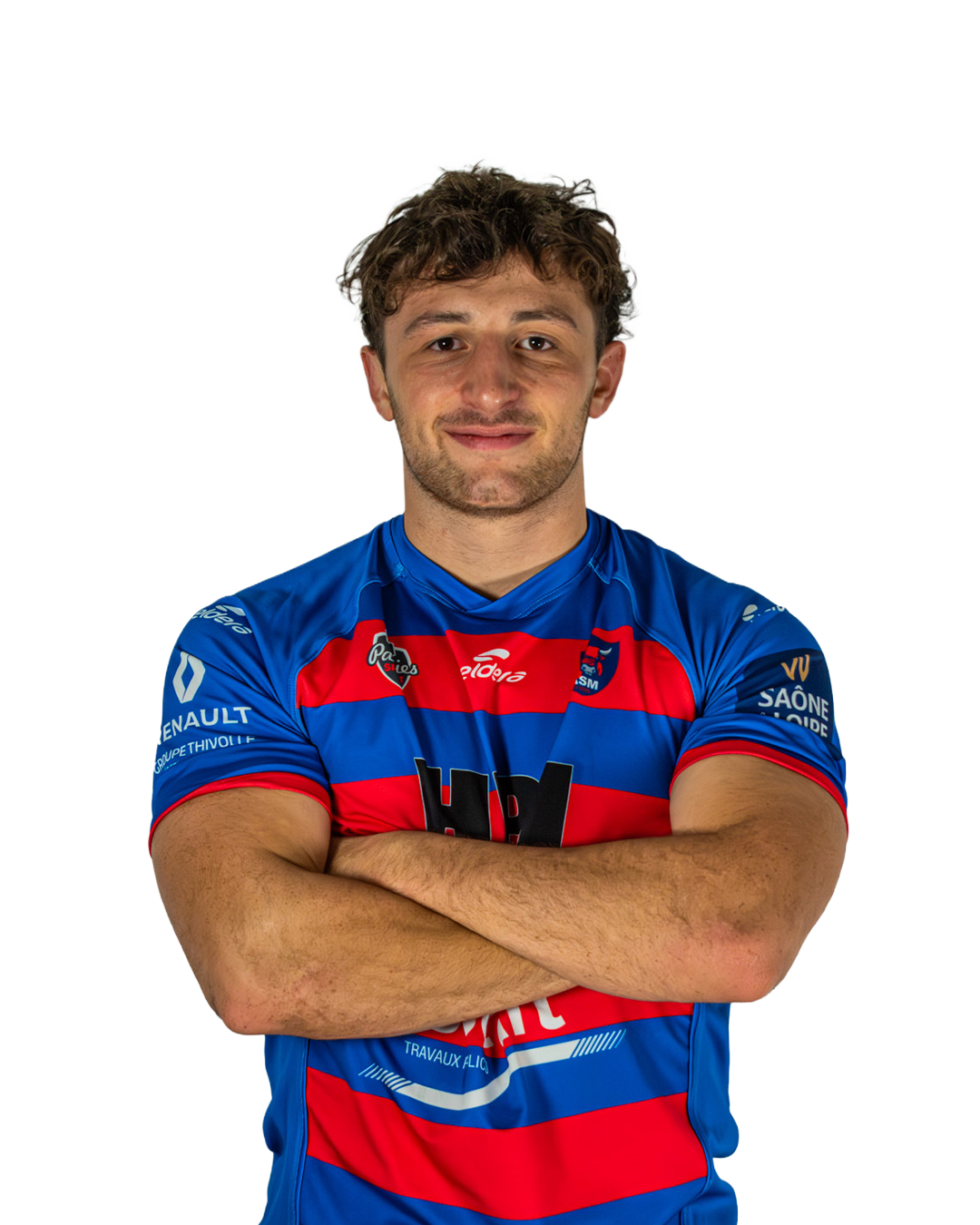 Jeune homme sportif en maillot de rugby bleu et rouge, bras croisés, souriant.