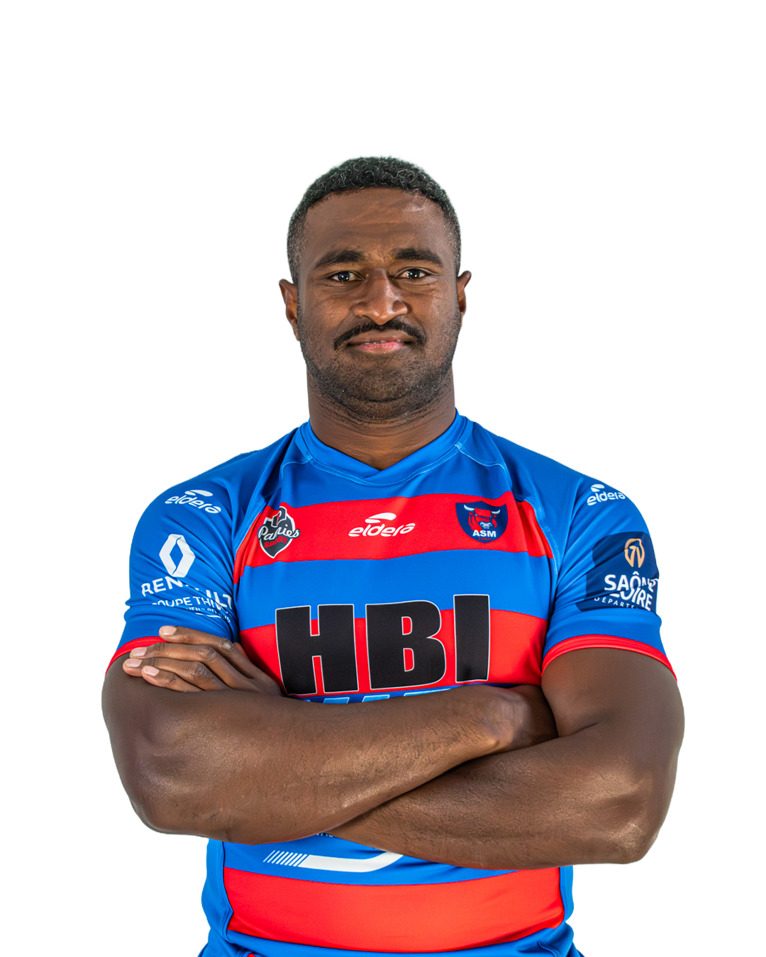 Un joueur de rugby en maillot bleu et rouge avec les bras croisés