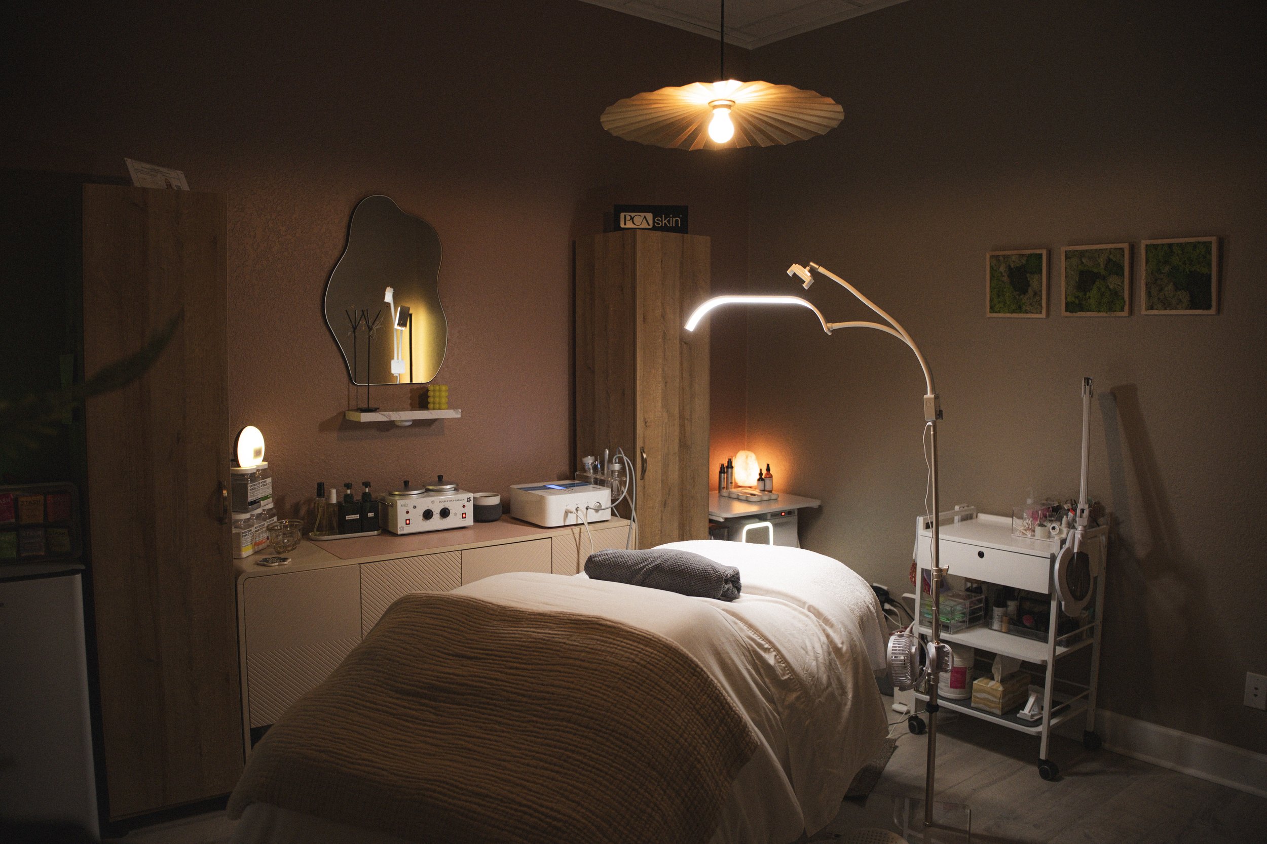 skincare studio interior, massage table, skincare and lash and brows in tampa