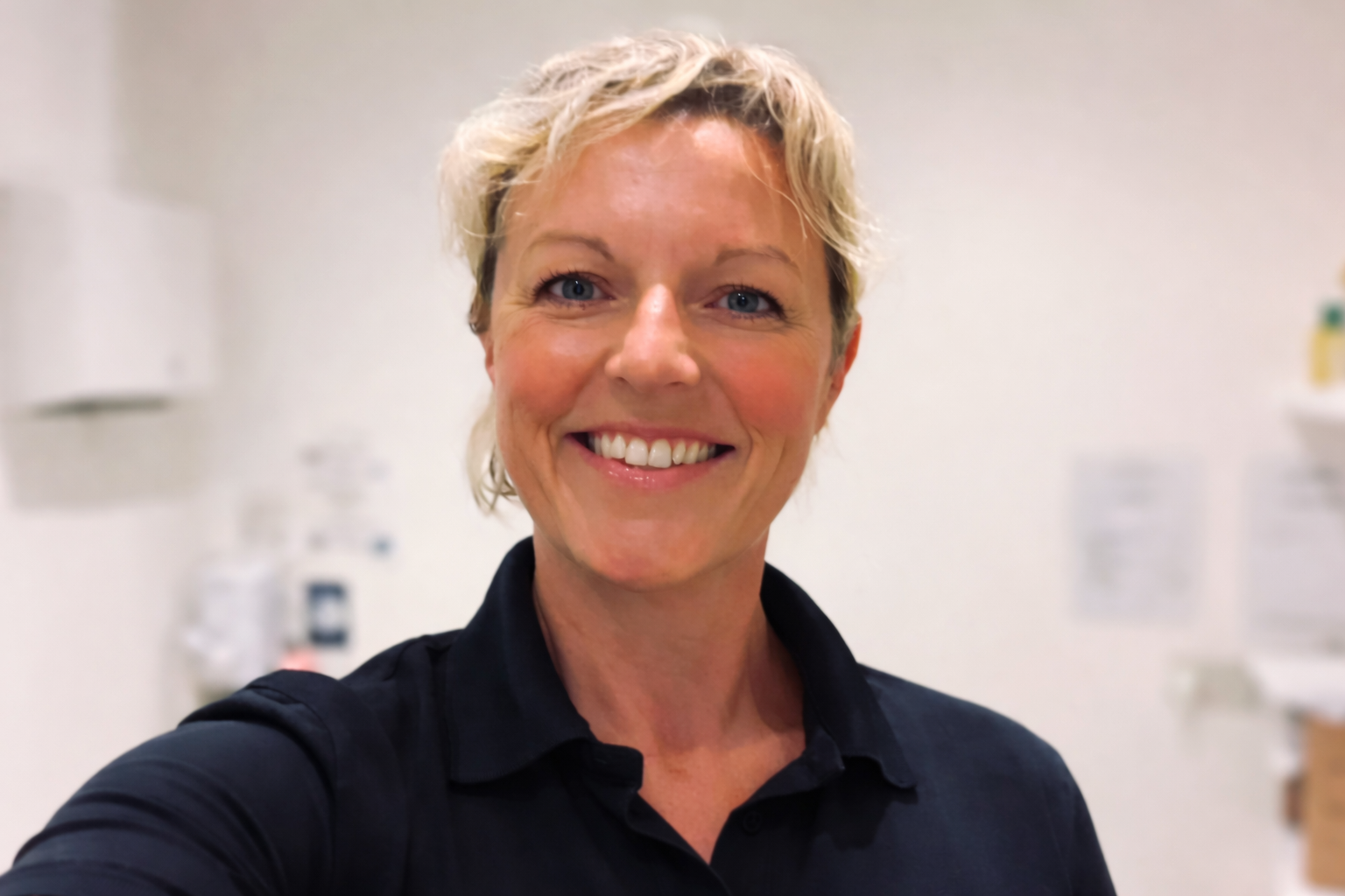 Placeholder avatar silhouette of a person with a blue background.