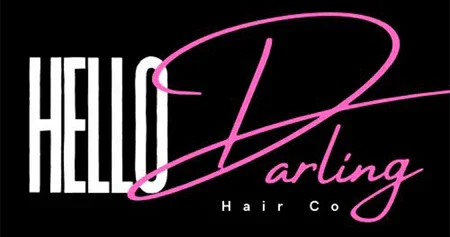 Logo for Hello Darling Hair Co. with stylized pink script text on a black background.