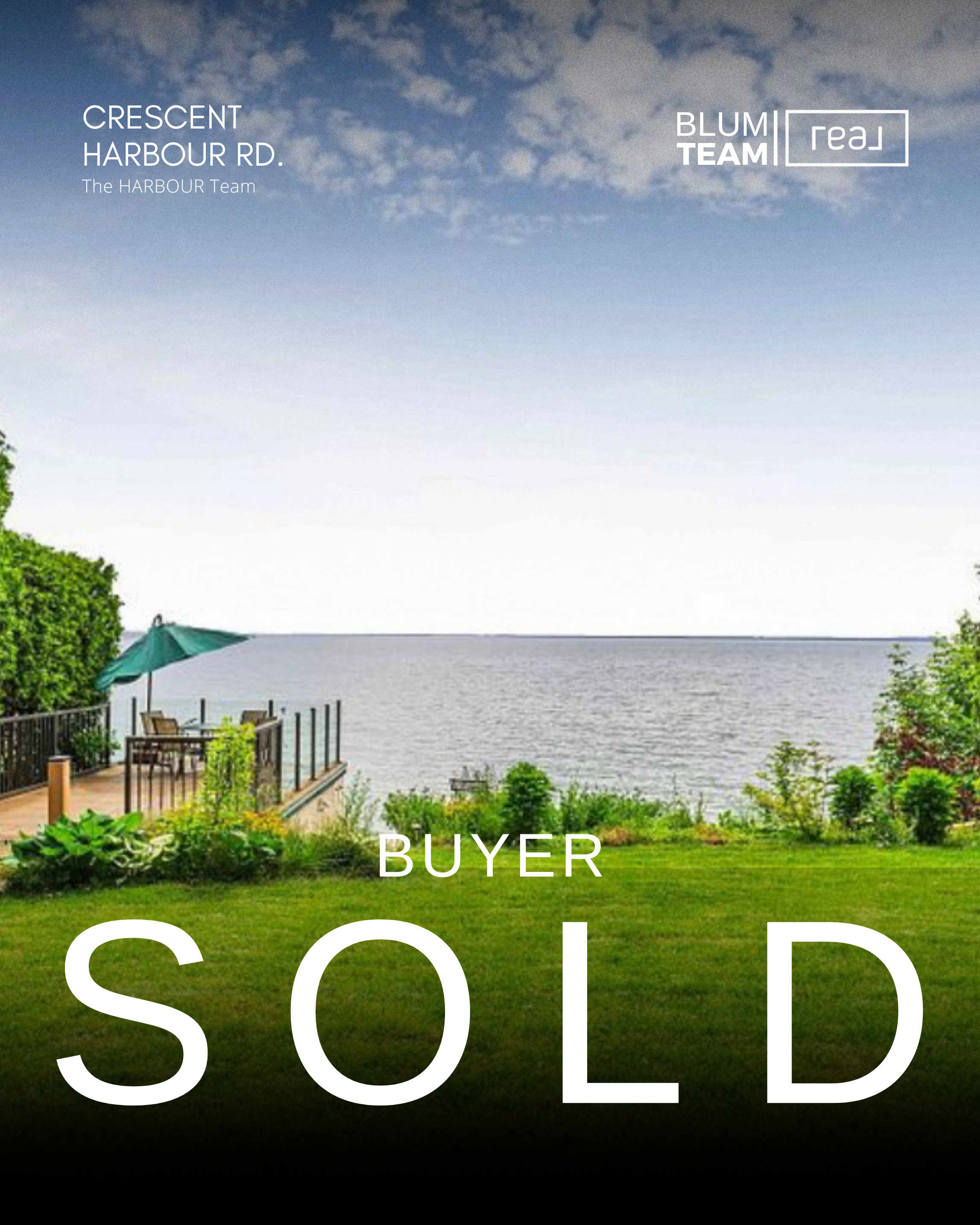 A waterfront property with a lawn, garden, and a wooden deck with patio furniture and an umbrella, overlooking a body of water under a partly cloudy sky. The image includes text indicating it is a real estate listing for Crescent Harbour Rd by the HARBOUR Team, with a label 'Buyer Sold'.